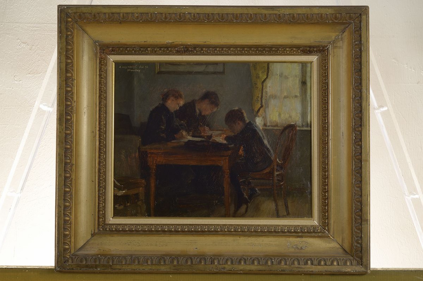 Detail k: August Johann Holmberg, 1851-1911 München, drei Kinder bei den Schularbeiten, Öl/Lwd, links oben signiert, dat. Sept. 92, bez.: Starnberg, ca. ...