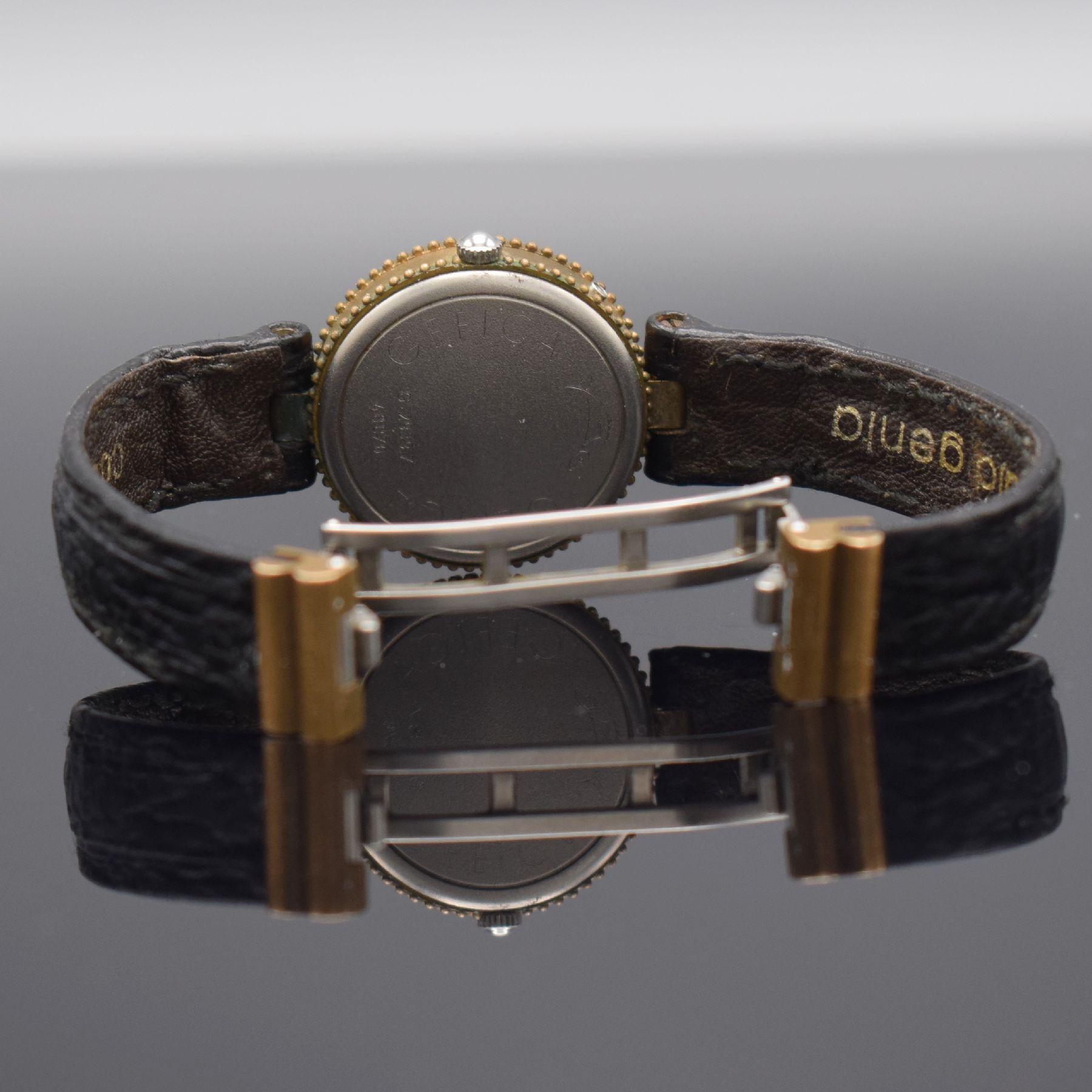 Detail f: GERALD GENTA seltene Damenarmbanduhr Serie Gefica Referenz G 2939.7, Schweiz um 1990, bronziertes Geh. inkl. orig. Lederband m. dopp. Faltschl., ...