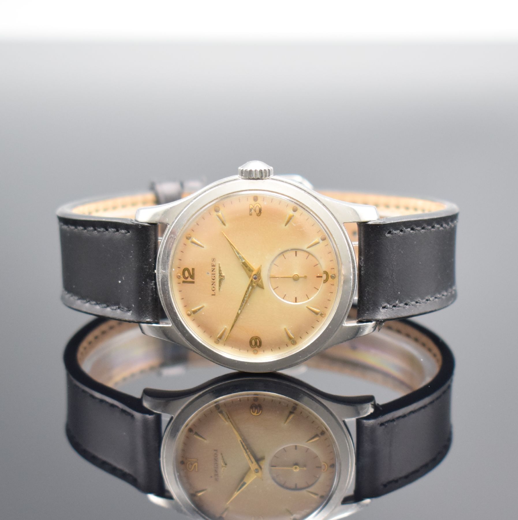 LONGINES Herrenarmbanduhr Ref. 6263 21 in Stahl, Schweiz um 1953, Handaufzug, 2-teil. Geh., Boden geschr., bräunl. pat. Zifferbl. m. aufges. gold. ...