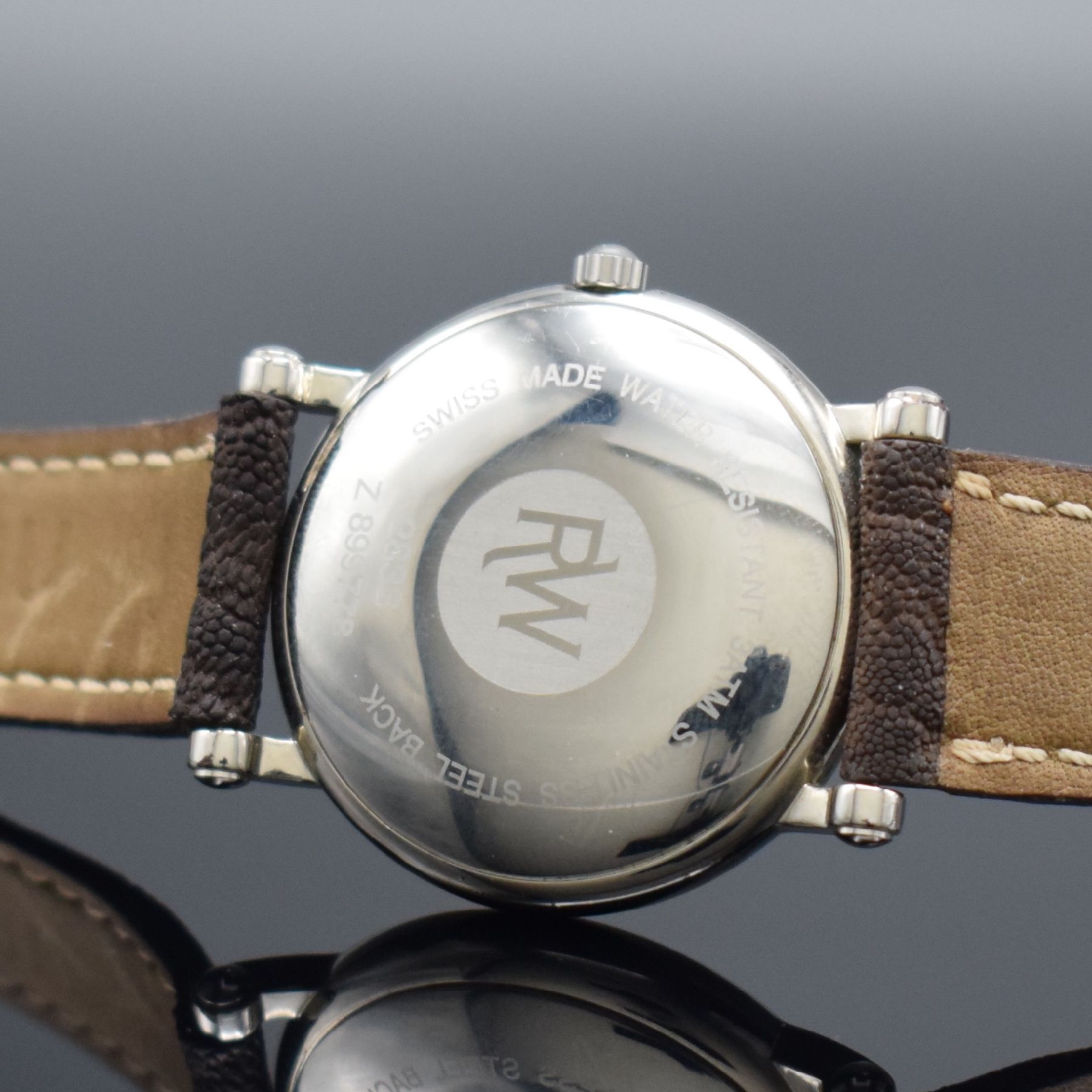 Detail h: Konvolut 4 moderne Armbanduhren, alle Automatik, Schweiz um 2000, 1 x Raymond Weil, Edelst.-Boden aufgedr., 25 St., Kal. ETA 2824 -2, D. ca. 34 mm, 1 ...