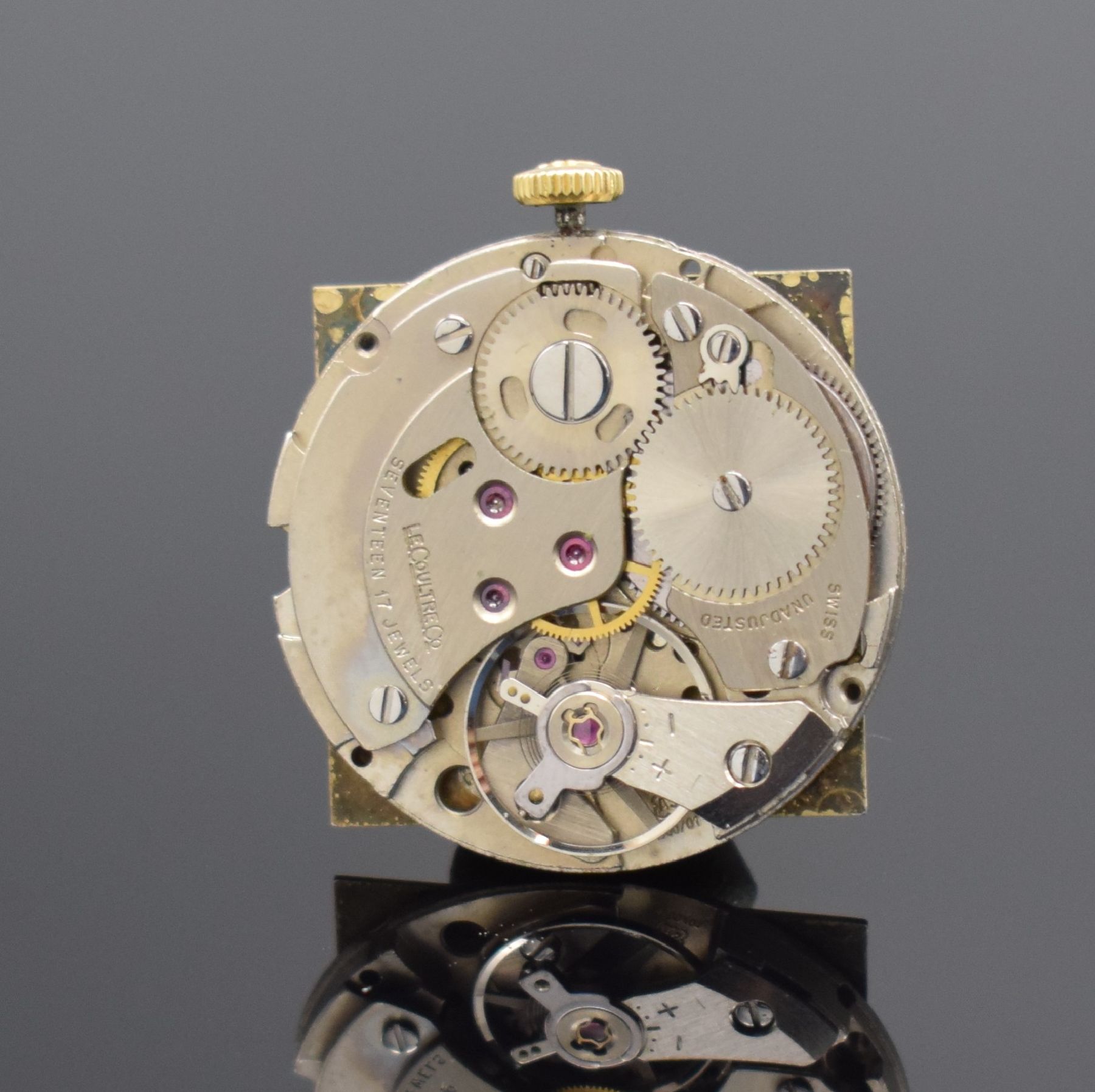 Detail f: Jaeger-LeCoultre Armbanduhr in GG 750/000, Schweiz um 1970, Handaufzug, rechteck. Geh. teils angel., Boden aufgedr., gold. Zifferbl. m. gold. aufges. ...