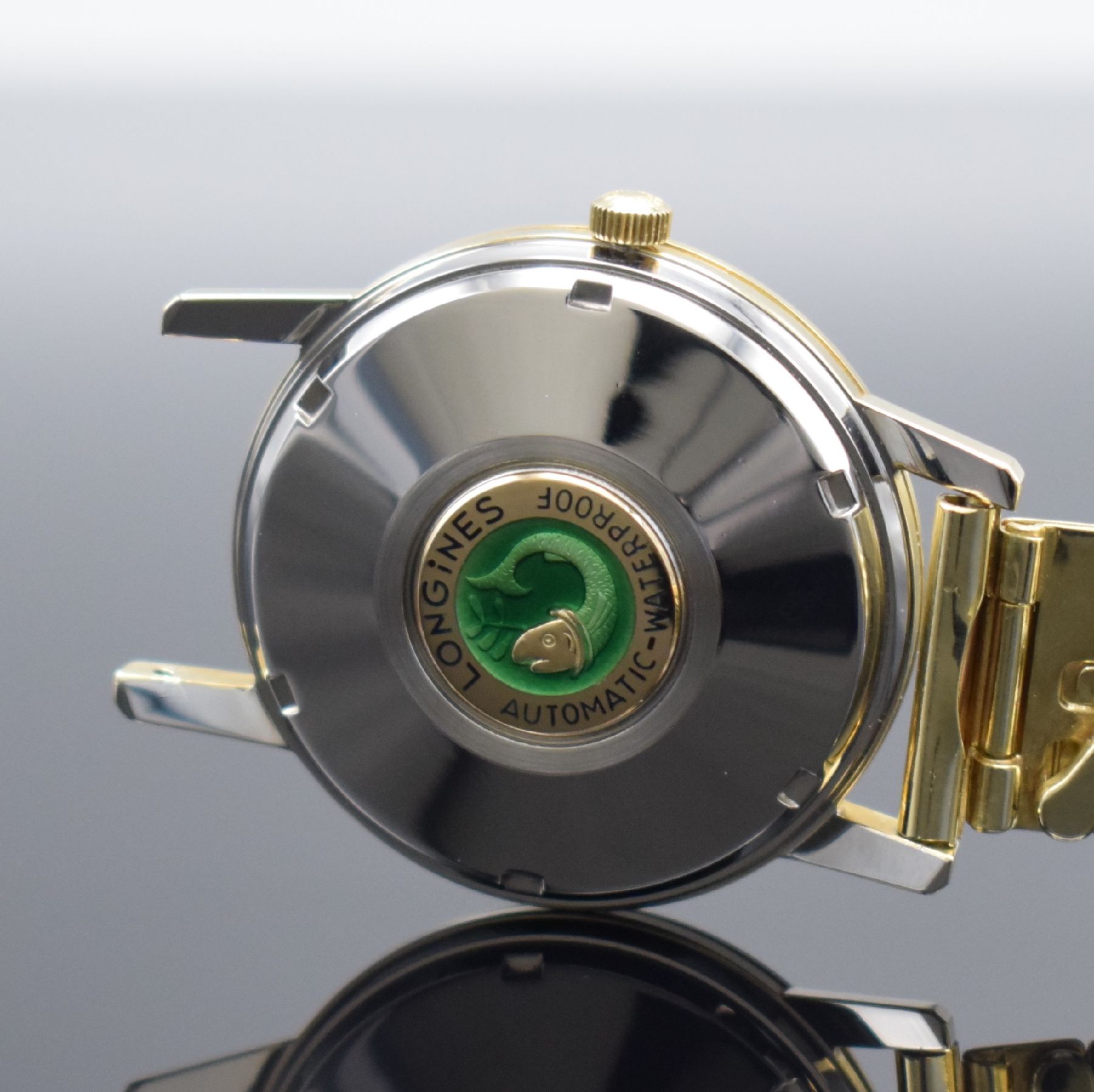 Detail e: LONGINES Conquest Ref. 9022 Herrenarmbanduhr, Schweiz um 1966, Automatik, 3-teil. Stahlgeh. m. Goldhaube, verschr. Stahlboden m.Goldplakette, orig. ...