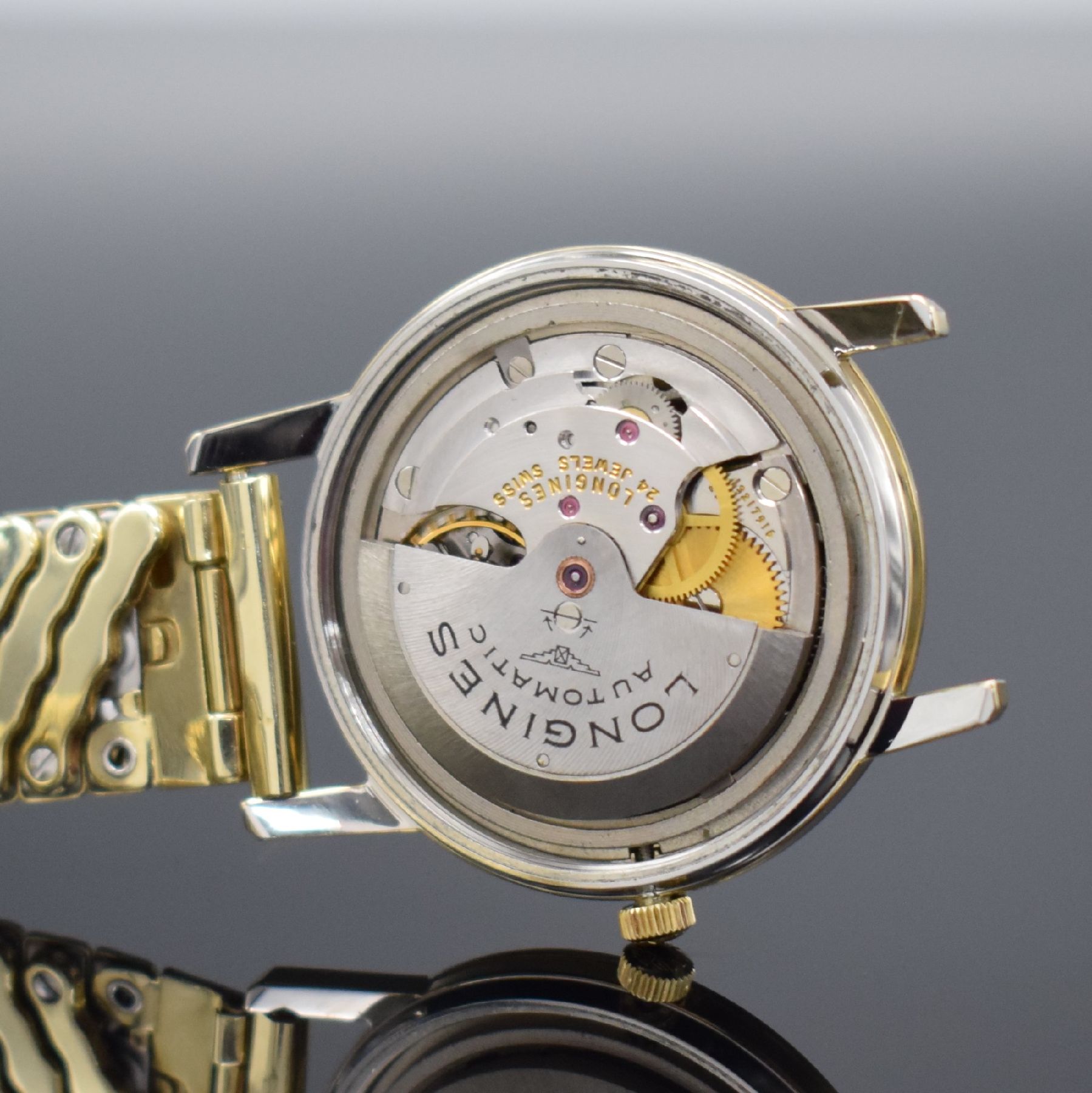 Detail h: LONGINES Conquest Ref. 9022 Herrenarmbanduhr, Schweiz um 1966, Automatik, 3-teil. Stahlgeh. m. Goldhaube, verschr. Stahlboden m.Goldplakette, orig. ...