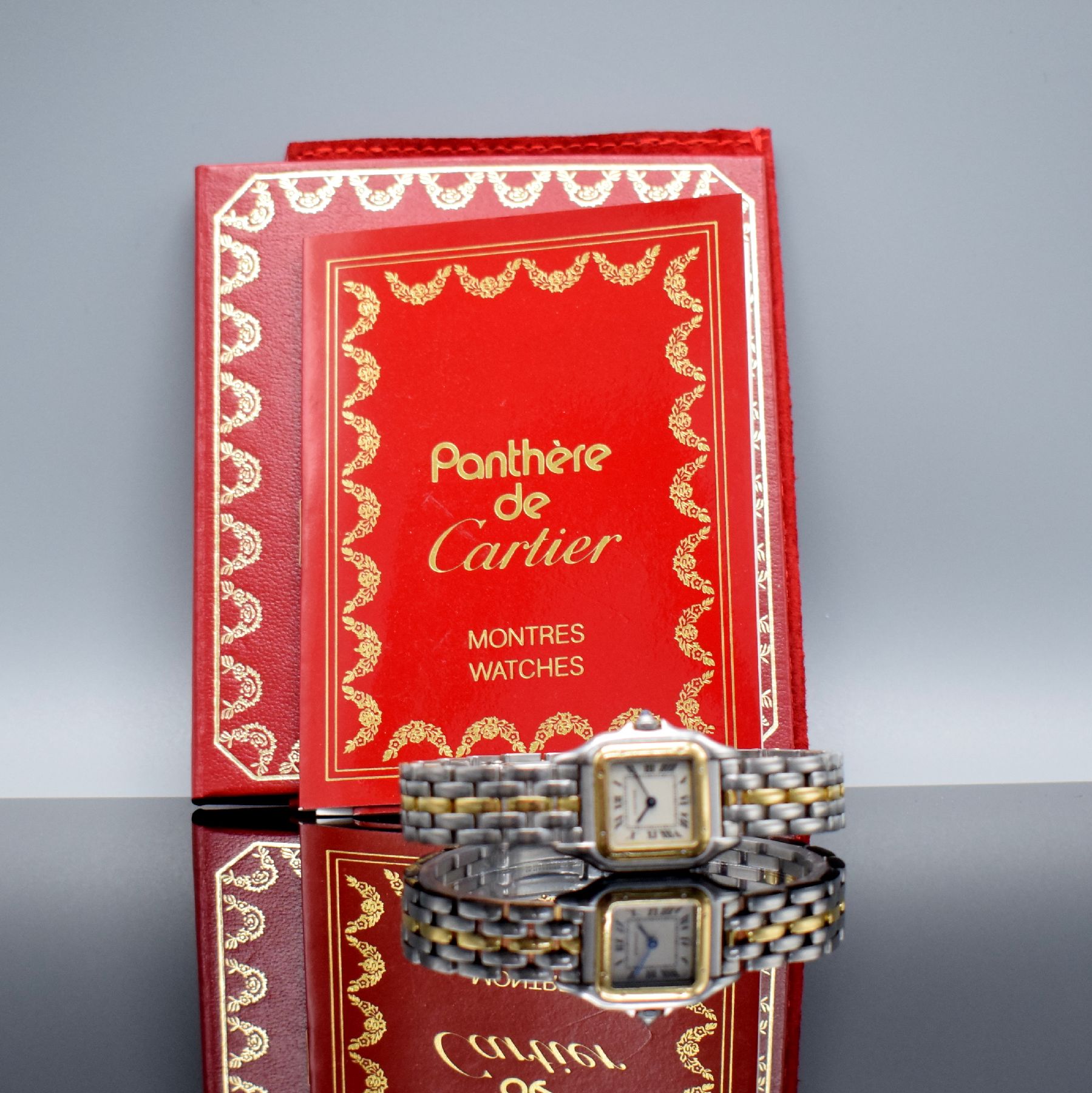 Detail e: CARTIER Panthere Damenuhr in Stahl/GG 750/000, Schweiz lt. orig. Rechnung verk. 12/1987, quarz, 8-fach verschr. Geh., orig. Stahl/GG- Band m. doppel. ...