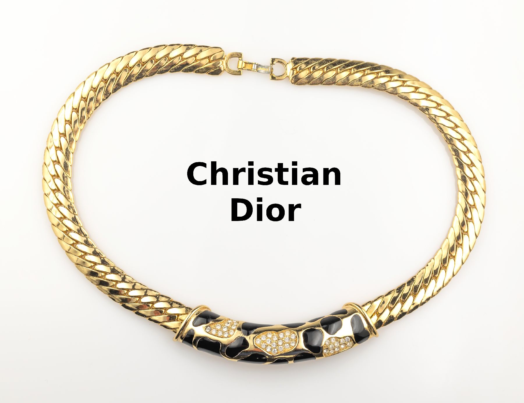 Modeschmuckcollier CHRISTIAN DIOR, 1960er Jahre, sign. Chr. Dior, schwarzer Lack, farbloser facett. Straßbesatz, L. ca. 39 cm