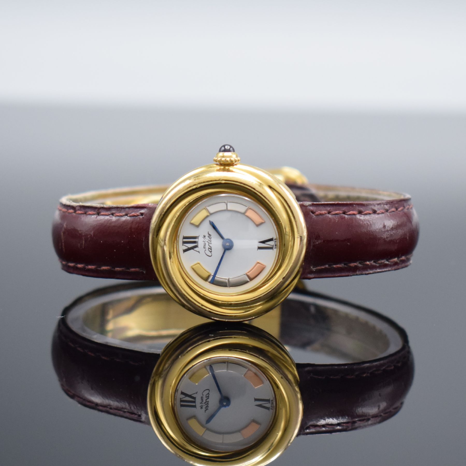 CARTIER Vermeil Trinity Damenarmbanduhr, Schweiz um 2000, quarz, verg. Sterlingsilbergeh. 4-fach verschr., orig. Lederband m. verg. Faltschl., ...