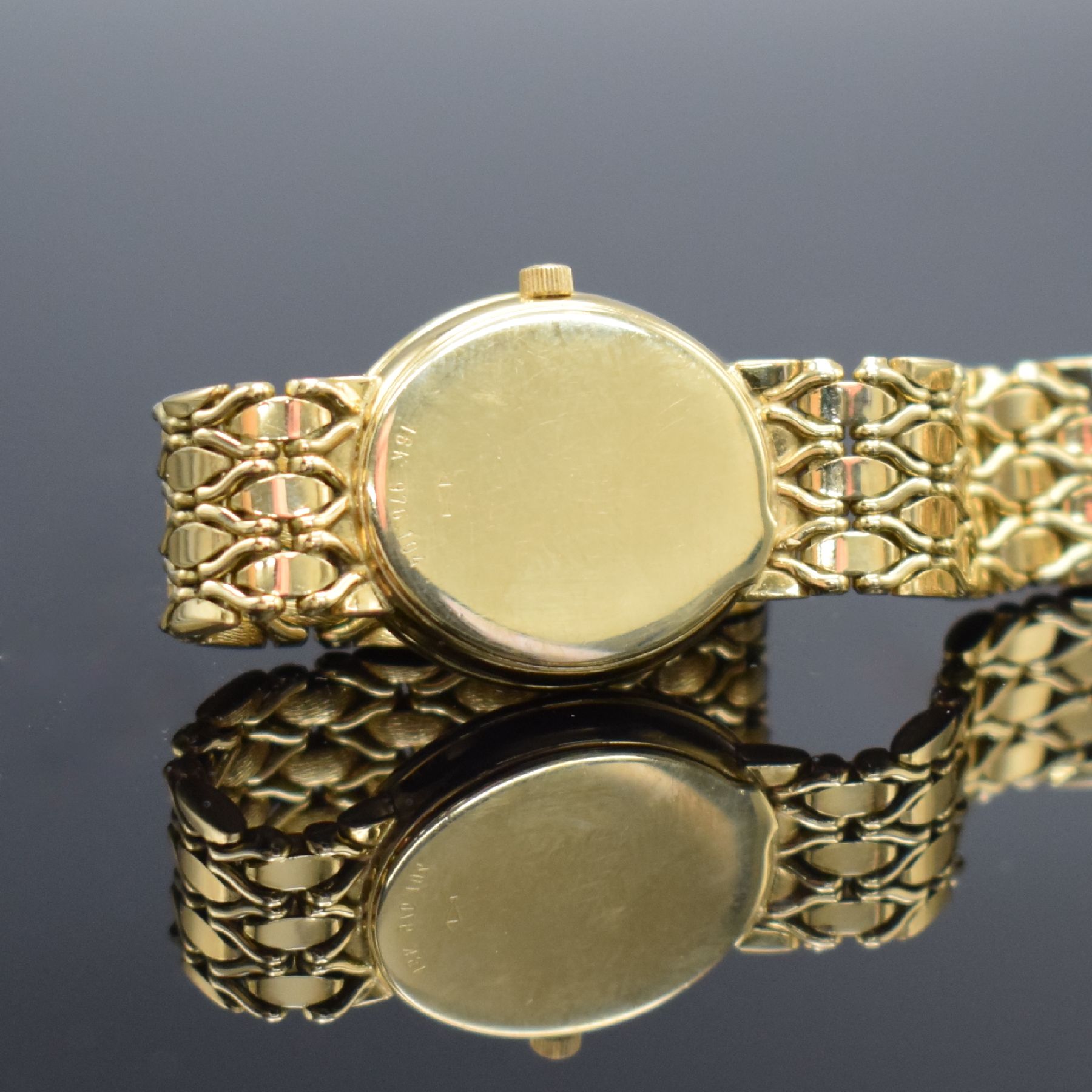 Detail g: BUCHERER hochwertige mit Brillanten besetzte Damenarmbanduhr in GG 750/000, Schweiz um 1995, quarz, ovales Geh., Boden aufgedr., Lünette m. ca. 1,3 ...