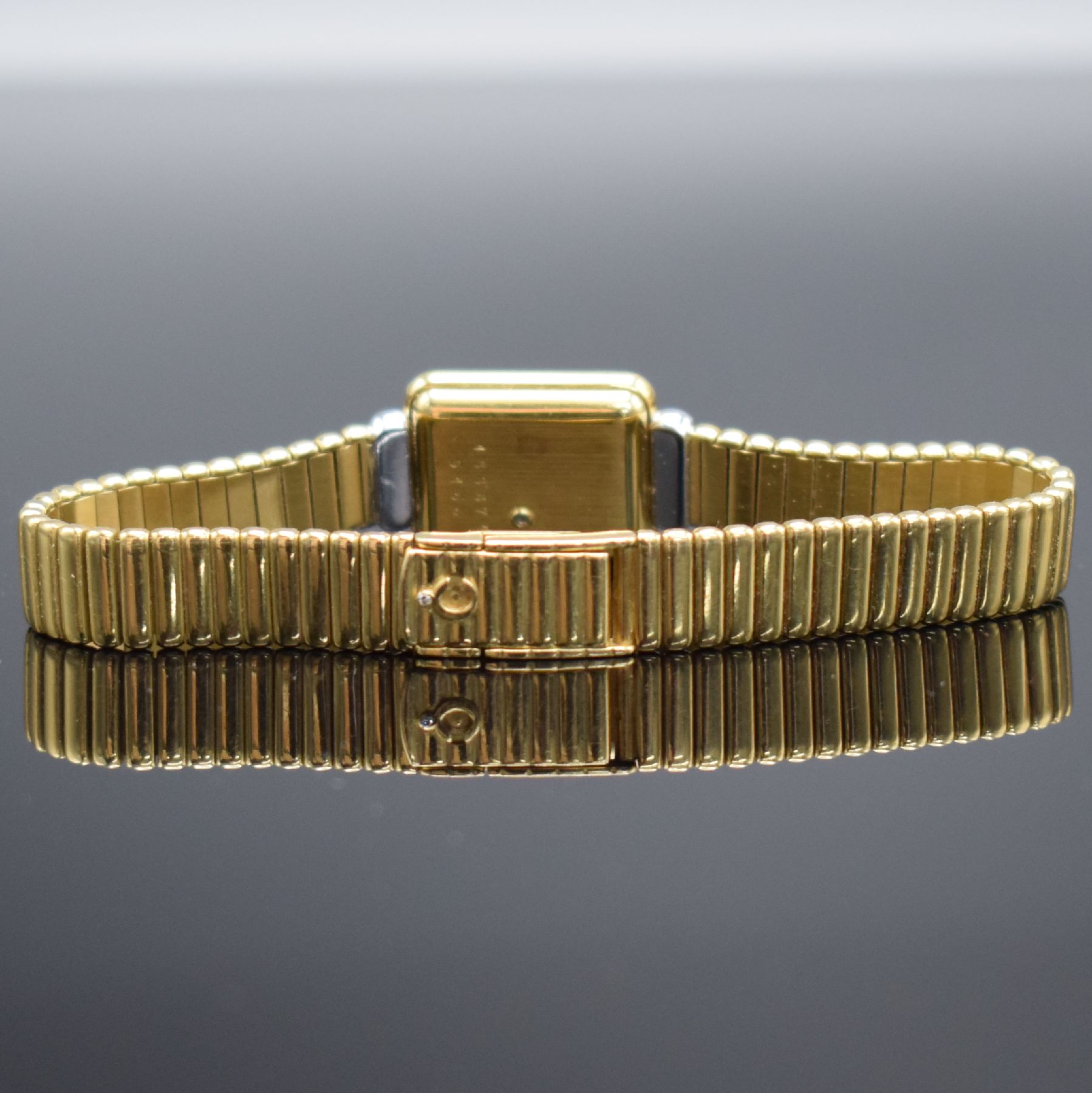 Detail e: CHOPARD diamantbesetzte Damenarmbanduhr in GG 750/000, Schweiz um 1985, quarz, rechteck. Geh., Boden aufgedr., Zeigerstellung über Drücker im ...