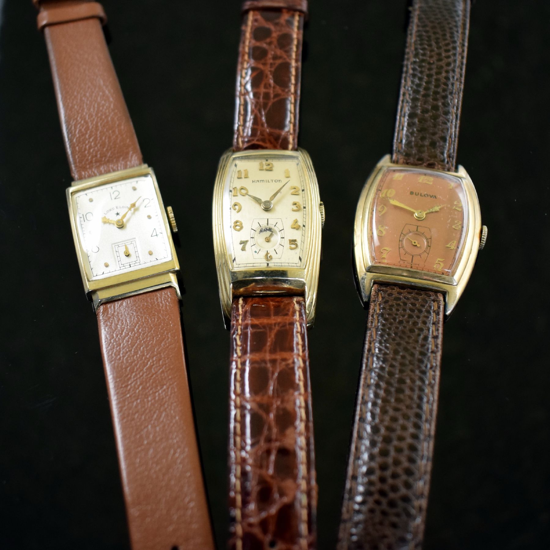 Detail k: LORD ELGIN, BULOVA, HAMILTON 3 Armbanduhren, USA um 1940, Handaufzug, 1.) Lord Elgin in GG 585/000, Kal. 559, M. ca. 27 x 20 mm, Überh. fäll., EZ ...