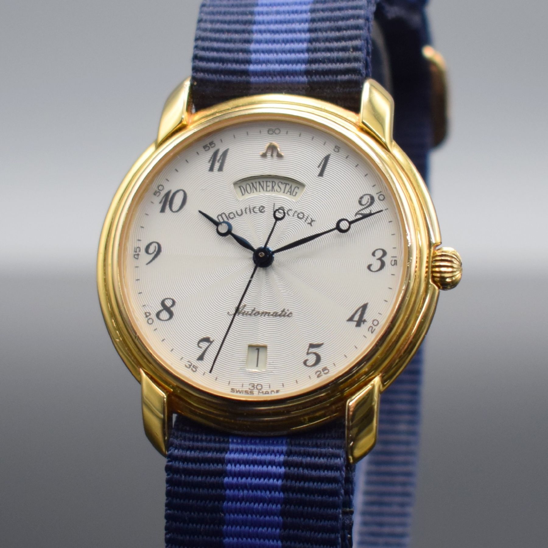 Detail c: MAURICE LACROIX Herrenarmbanduhr, Schweiz um 1990, Automatik, Ref. 09329, verg. Geh., Stahlboden aufgedr., silb. guill. Zifferbl. mit arab. Zahlen, ...