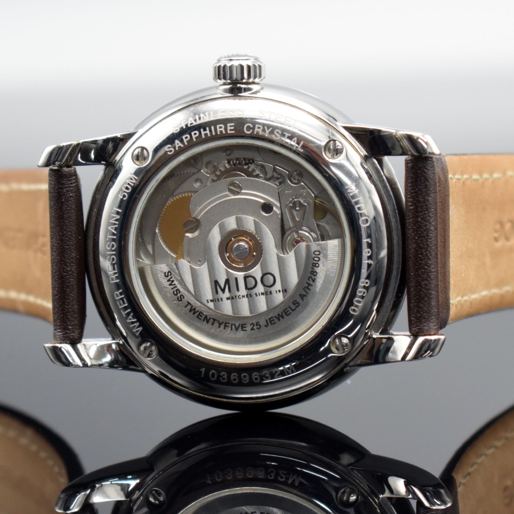 Detail e: MIDO Baroncelli Herrenarmbanduhr, Schweiz um 2015, Automatik, Ref. 8600, beids. vergl. Geh. in Edelstahl, Boden 4-fach verschr., schwarzes Zifferbl. ...