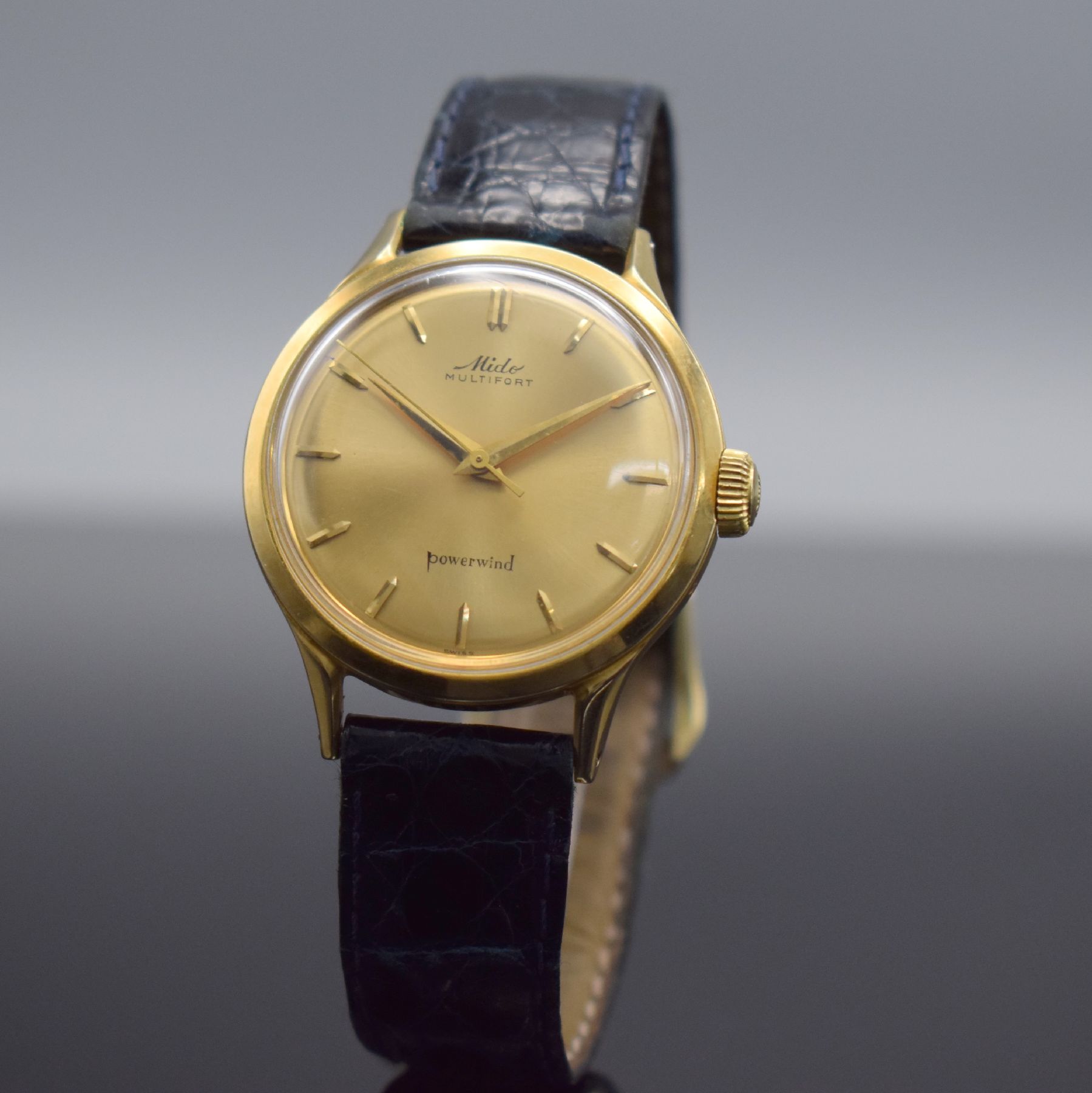 Detail a: MIDO Multifort Herrenarmbanduhr in GG 585/000, Schweiz um 1960, Automatik, 2-teil. Geh., Boden geschr., orig. Krone, gold. Zifferbl. m. aufges. ...