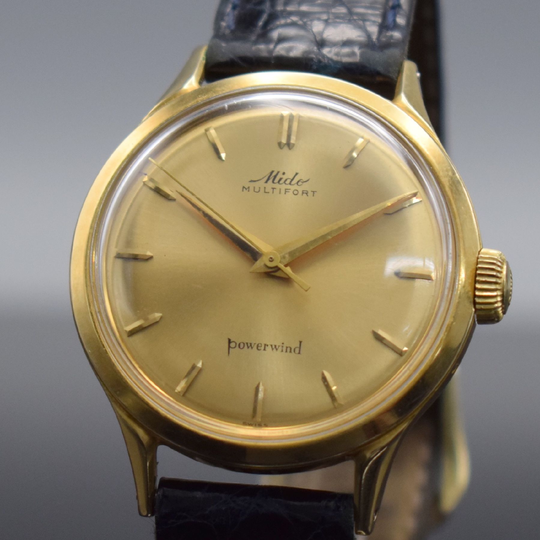 Detail b: MIDO Multifort Herrenarmbanduhr in GG 585/000, Schweiz um 1960, Automatik, 2-teil. Geh., Boden geschr., orig. Krone, gold. Zifferbl. m. aufges. ...