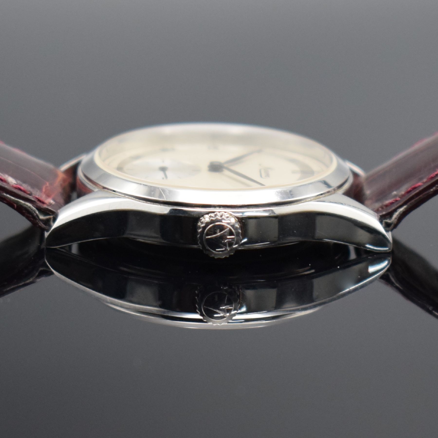 Detail d: MINERVA Kaliber 48 Herrenarmbanduhr Referenz A481, Schweiz um 2000, Handaufzug, beids. vergl. Edelstahlgeh., Boden geschr., silb. Duoton-Ziffebl. m. ...