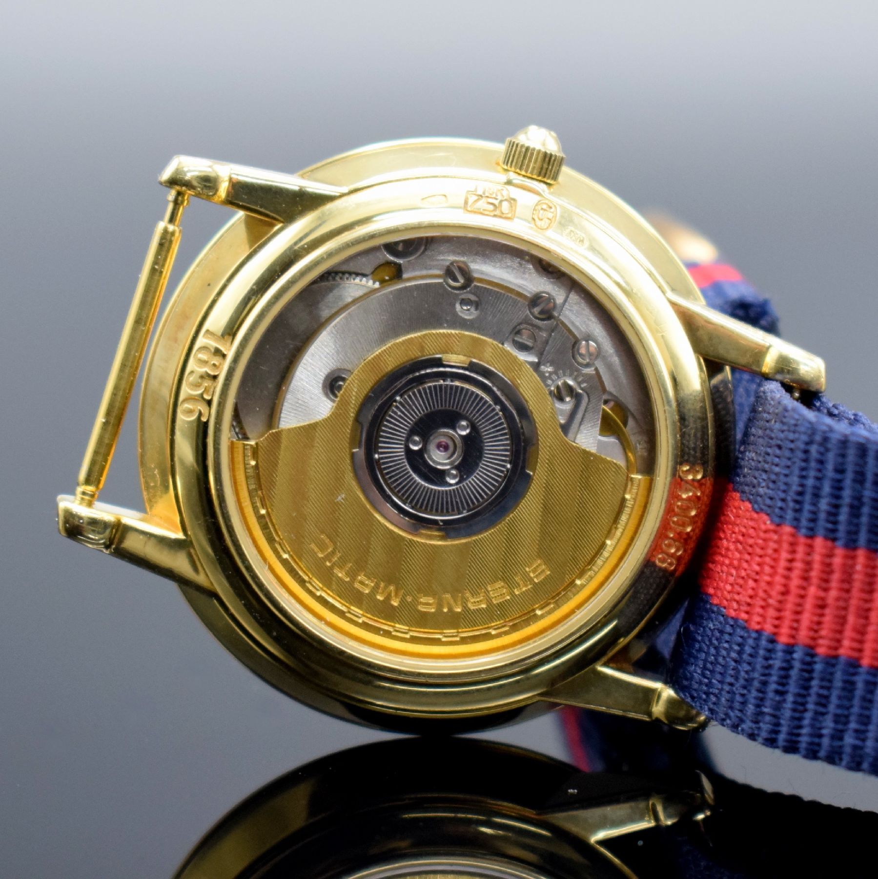 Detail g: ETERNA-MATIC Herrenarmbanduhr in GG 750/000, Schweiz um 2000, Automatik, beids. vergl. Gehäuse, Boden & Glasrand aufgedr., gold. Zifferbl. m. ...
