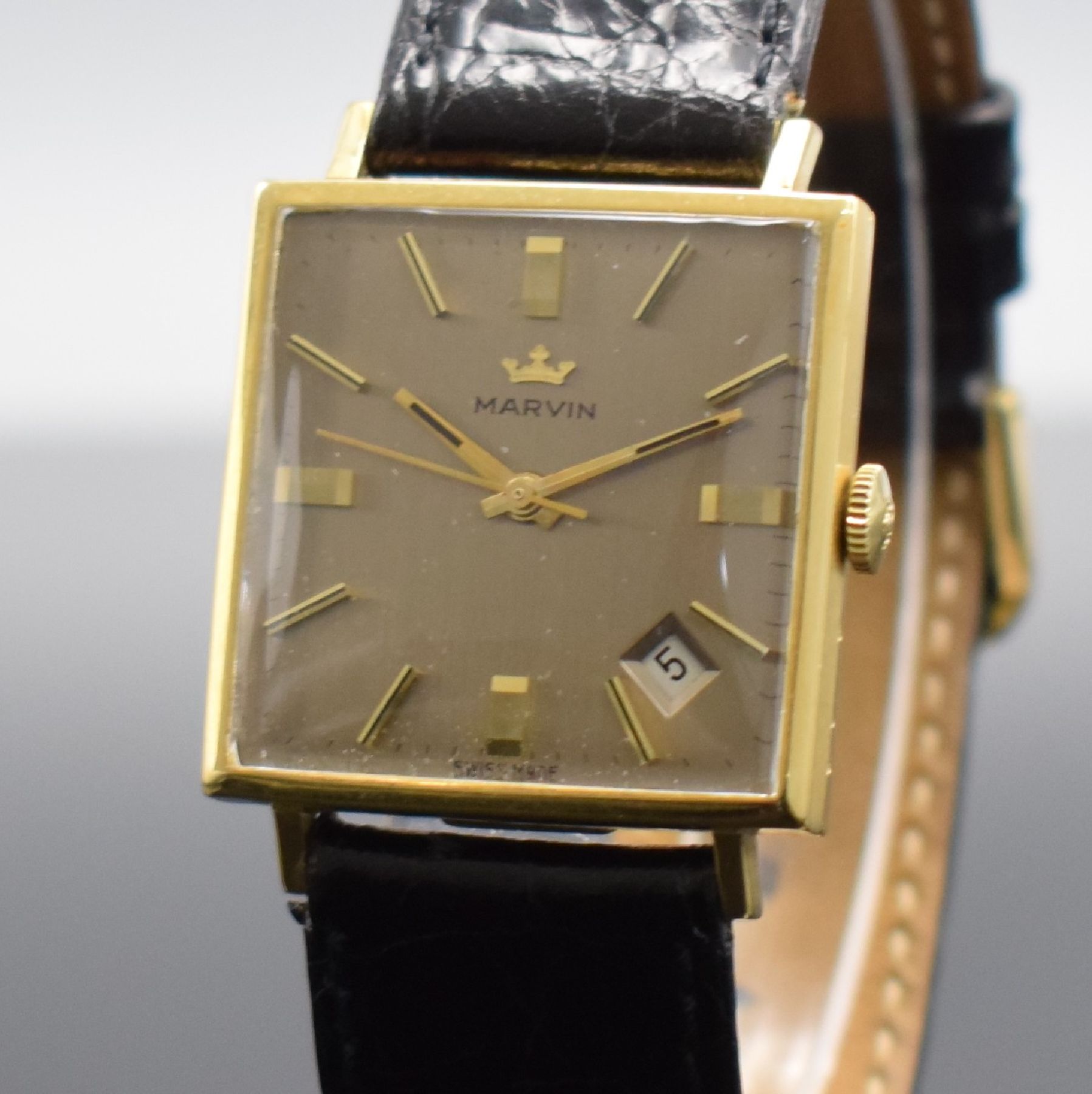 Detail a: MARVIN Herrenarmbanduhr in GG 750/000, Schweiz um 1965, Handaufzug, 2-teil. Geh., Boden aufgedr., gold. Zifferbl. m. aufges. Std.-Ind., gold. Zeiger, ...