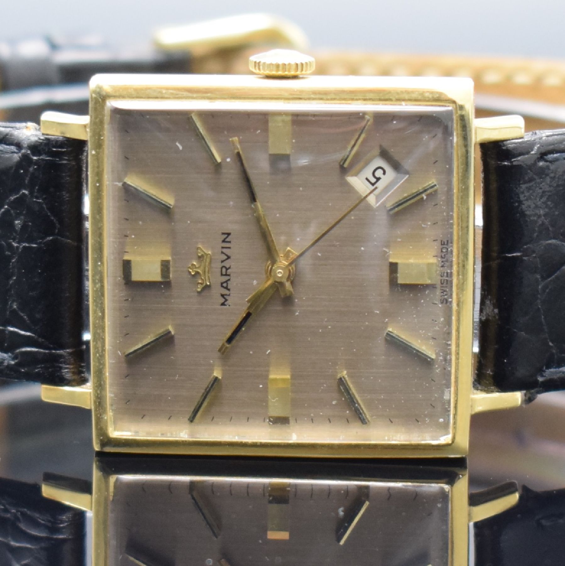 Detail b: MARVIN Herrenarmbanduhr in GG 750/000, Schweiz um 1965, Handaufzug, 2-teil. Geh., Boden aufgedr., gold. Zifferbl. m. aufges. Std.-Ind., gold. Zeiger, ...