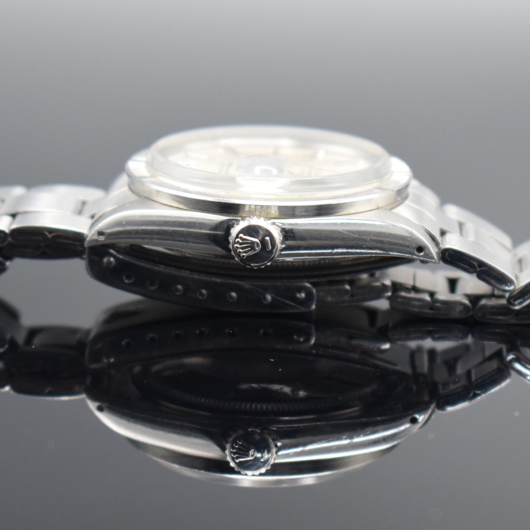 Detail g: ROLEX Date Oyster Perpetual Herrenarmbanduhr Referenz 1501, Schweiz lt. Bodengravur I. Quartal 1970, Automatik, Edelstahlgeh. inkl gefaltetem ...