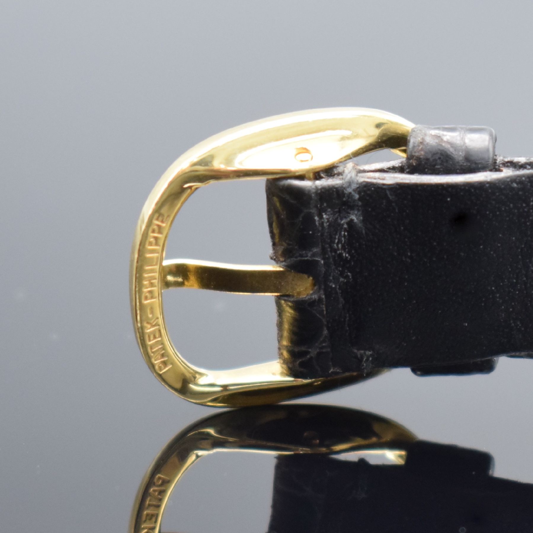 Detail e: PATEK PHILIPPE Ellipse d´Or Armbanduhr in GG 750/000 Referenz 3848, Schweiz um 1980, Handaufzug, ovales, 3-tlg. Geh., Boden & Glasrand aufgedr., ...