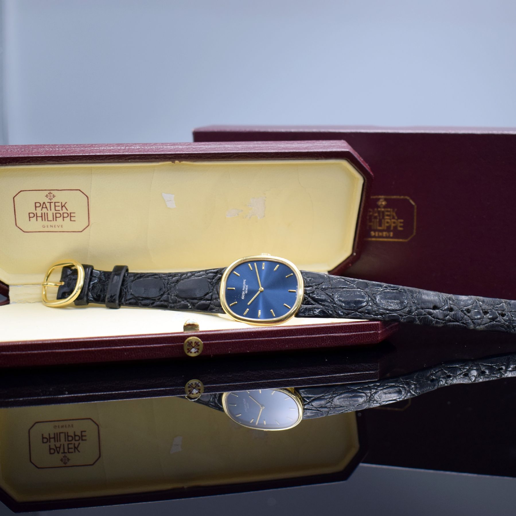 Detail i: PATEK PHILIPPE Ellipse d´Or Armbanduhr in GG 750/000 Referenz 3848, Schweiz um 1980, Handaufzug, ovales, 3-tlg. Geh., Boden & Glasrand aufgedr., ...