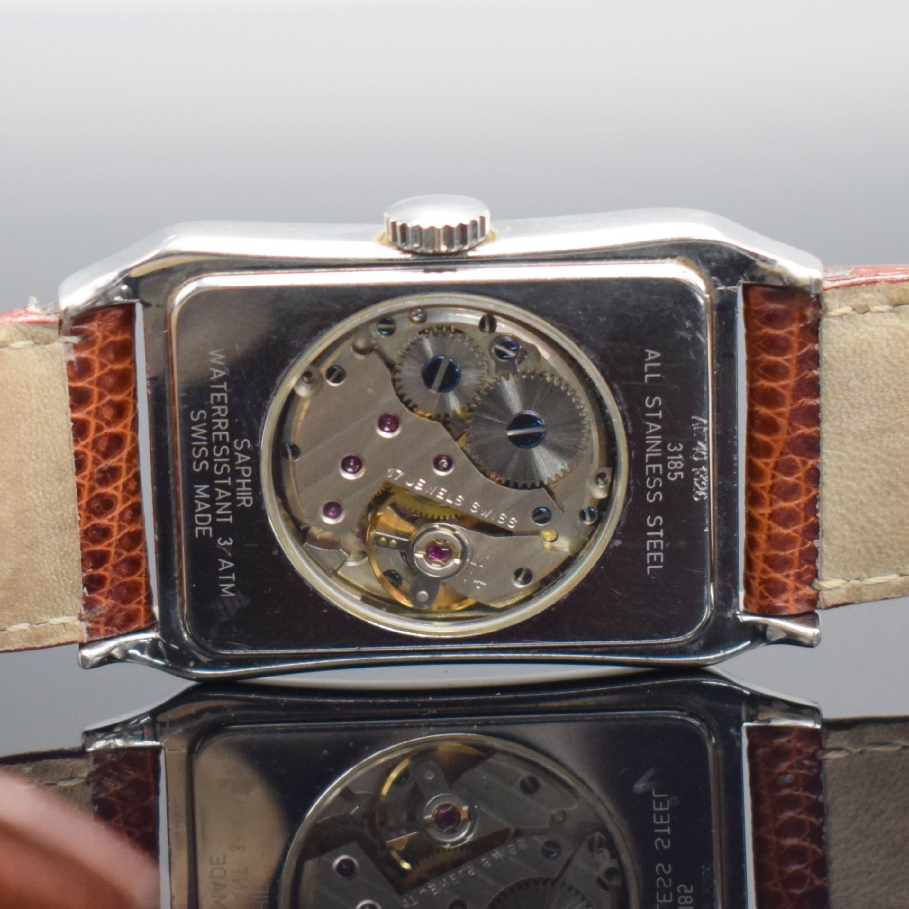 Detail f: ALPINA Chronos rechteckige Duo-Dial Herrenarmbanduhr in Stahl, Schweiz um 1990, beids. vergl. Geh., Boden aufgedr., silb. Duoton-Zifferbl. m. ...