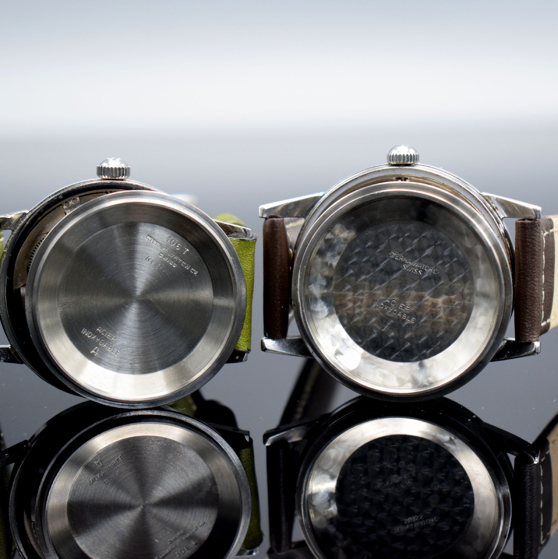 Detail g: ETERNA-MATIC 2 Armbanduhren mit schwarzem Zifferblatt in Stahl, Schweiz um 1950/1960, Automatik, verschr. Geh., orig. Kronen, Zifferblätter m. silb. ...