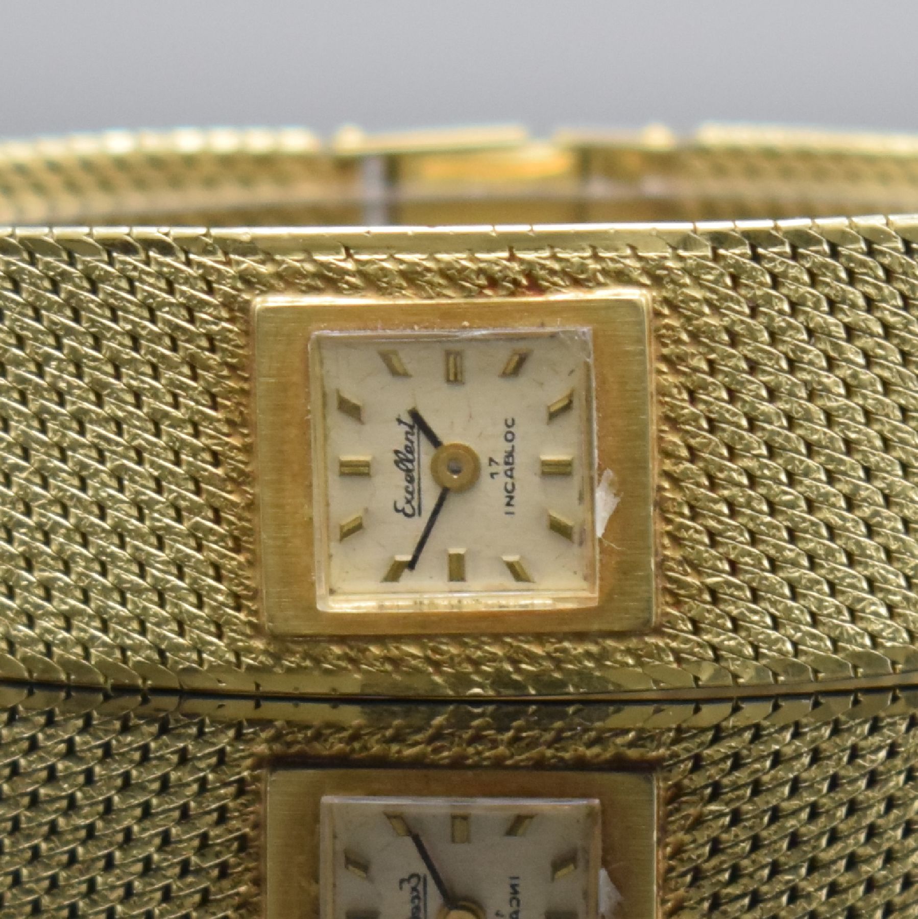 Detail a: Damenarmbanduhr in GG 585/000 bezeichnet Excellent, um 1960, im Kundenwunsch auf Quarzwerk umgebaut, Boden aufgedr., silb. Zifferbl. m. aufgel. ...