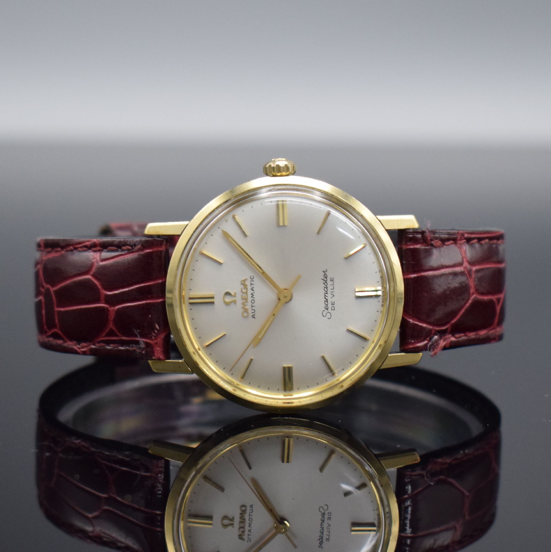 OMEGA Seamaster De Ville Herrenarmbanduhr in Stahl/Gold, Schweiz um 1969, Automatik, Monocoque-Geh. Ref. 165.020, orig. Krone & Glas, silb. ...