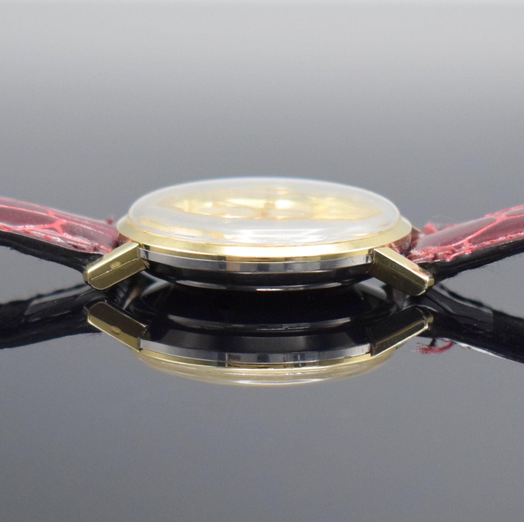 Detail e: OMEGA Seamaster De Ville Herrenarmbanduhr in Stahl/Gold, Schweiz um 1969, Automatik, Monocoque-Geh. Ref. 165.020, orig. Krone & Glas, silb. ...