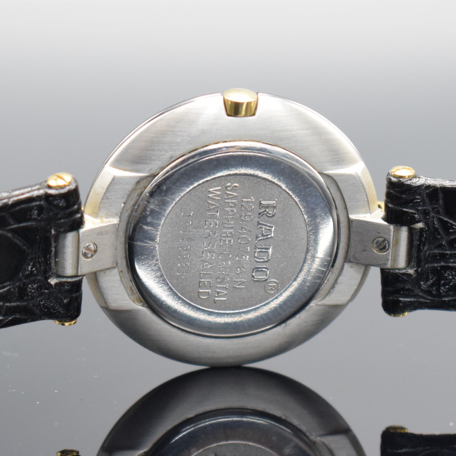 Detail d: RADO Damenarmbanduhr, Schweiz lt. orig. Papier verk. 09/1996, quarz, Stahlboden aufgedr., Ref. 129.4075.4N, gewölbtes Saphirglas, verg. Anstöße, ...