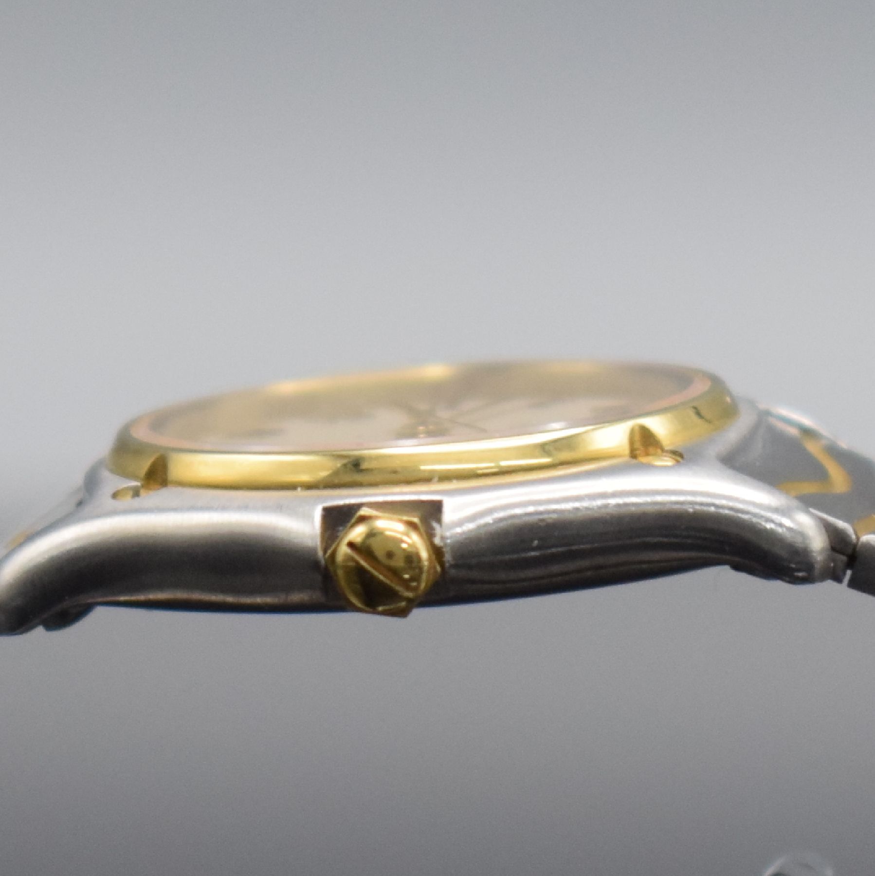 Detail d: EBEL Damenarmbanduhr Classic Wave in Stahl/Gold, Schweiz um 1993, quarz, Ref. 183908, Lünette gegen Geh. 5-fach verschr., orig. Wellengliederband m. ...