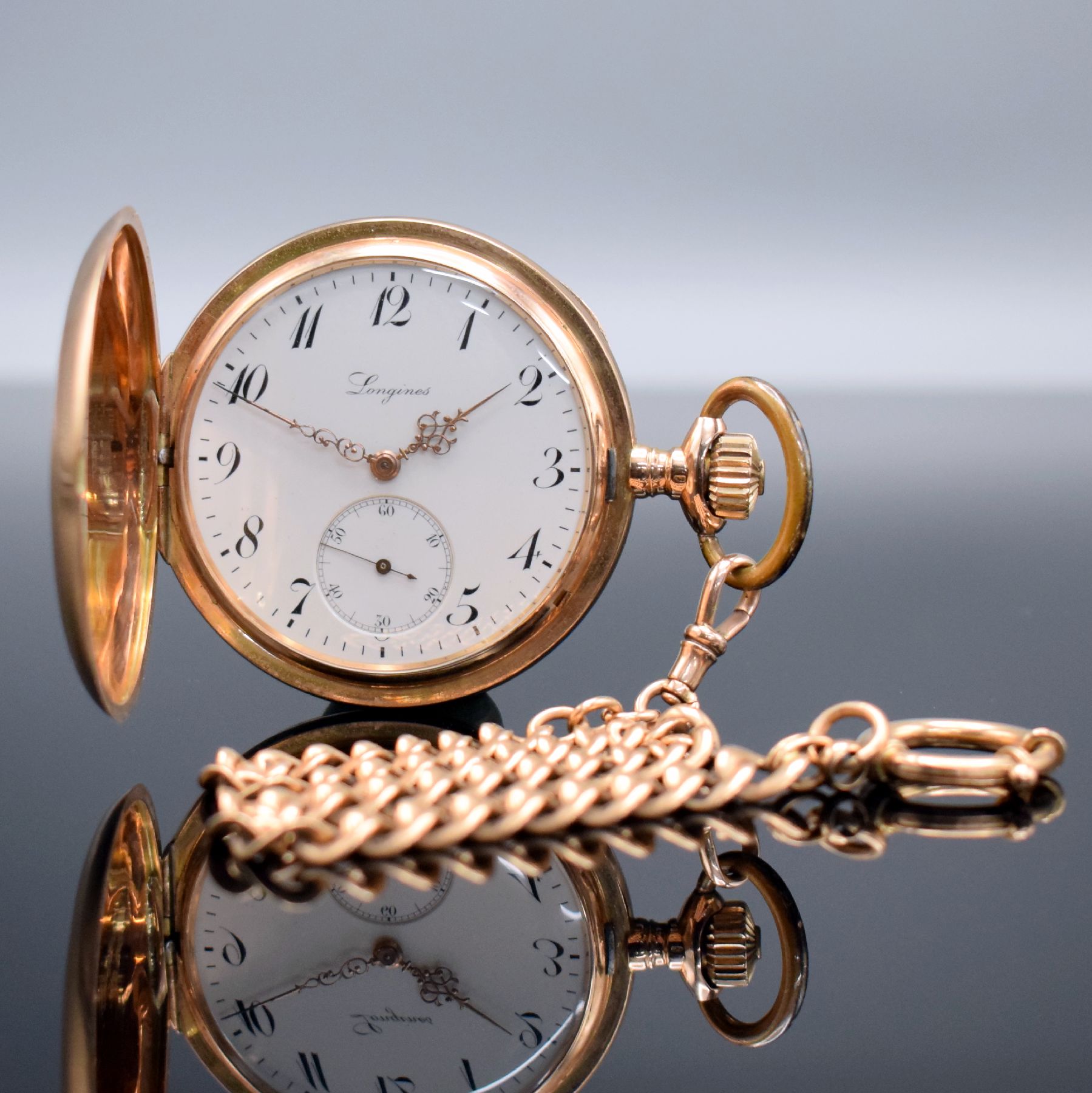 LONGINES Herrensavonette in RG 585/000 mit Kette in RG 585/000, Schweiz um 1906, guill. 3 Deckel-Goldgeh. dell., Sprungdeckel m. Monogramm, ...