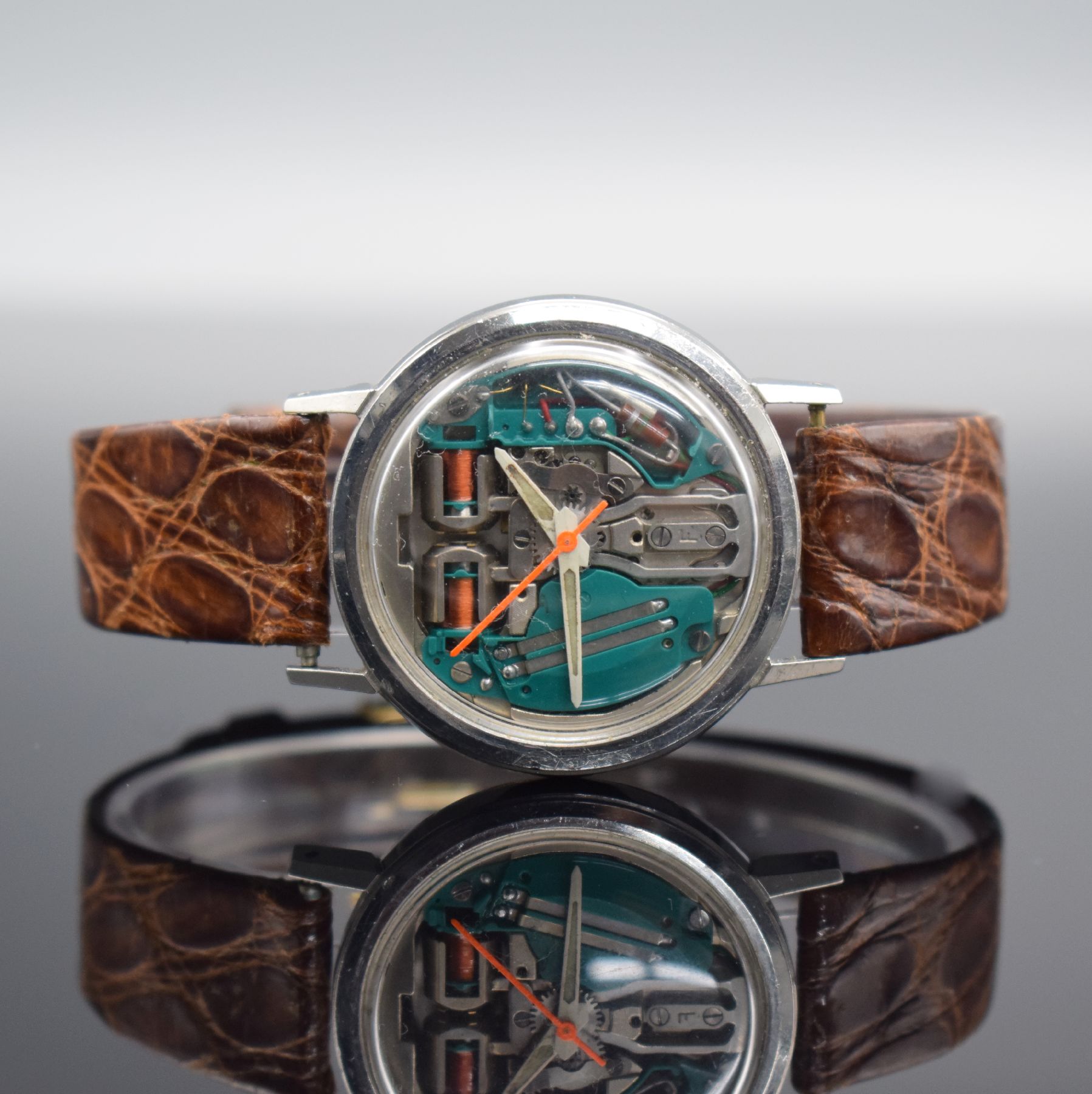 BULOVA Herrenarmbanduhr Accutron Spaceview, Schweiz um 1968, Edelstahlgeh., Boden verschr., sichtbares Stimmgabelschwingerwerk, Batteriefach & ...