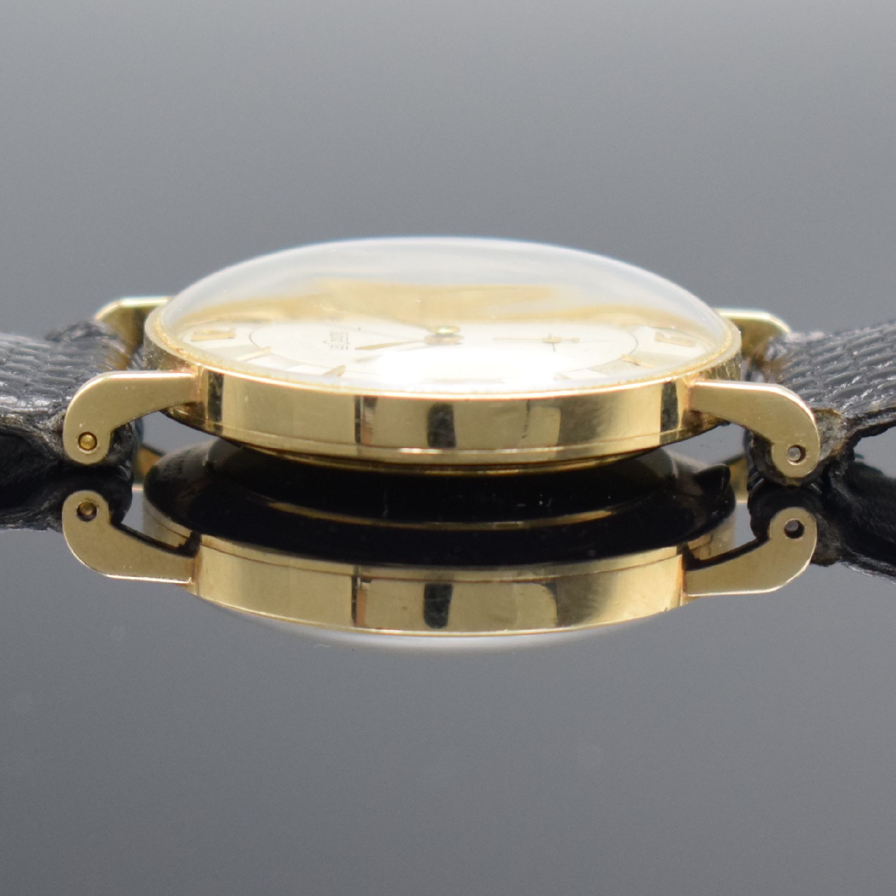 Detail e: LeCoultre Herrenarmbanduhr in GG 585/000 Referenz 727-722-103, Schweiz/USA um 1955, Handaufzug, 2-teil. Geh., Boden aufgedr., ausgef. ...