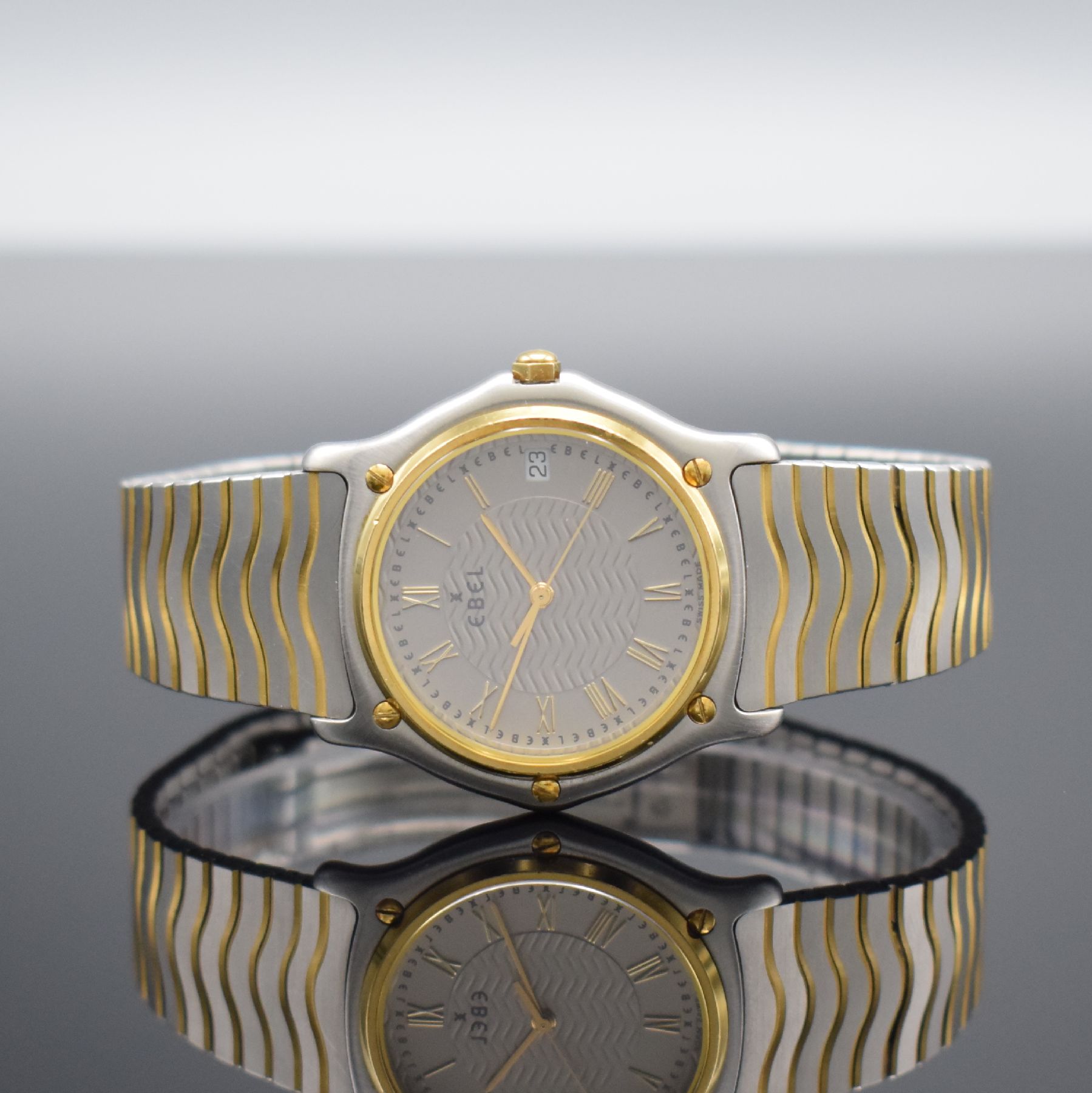 EBEL Sport Classique Armbanduhr, Schweiz um 1995, quarz, Ref. E1187141, Stülpgeh. in Edelstahl, GG-Lünette 5-fach verschr., Gliederband in ...