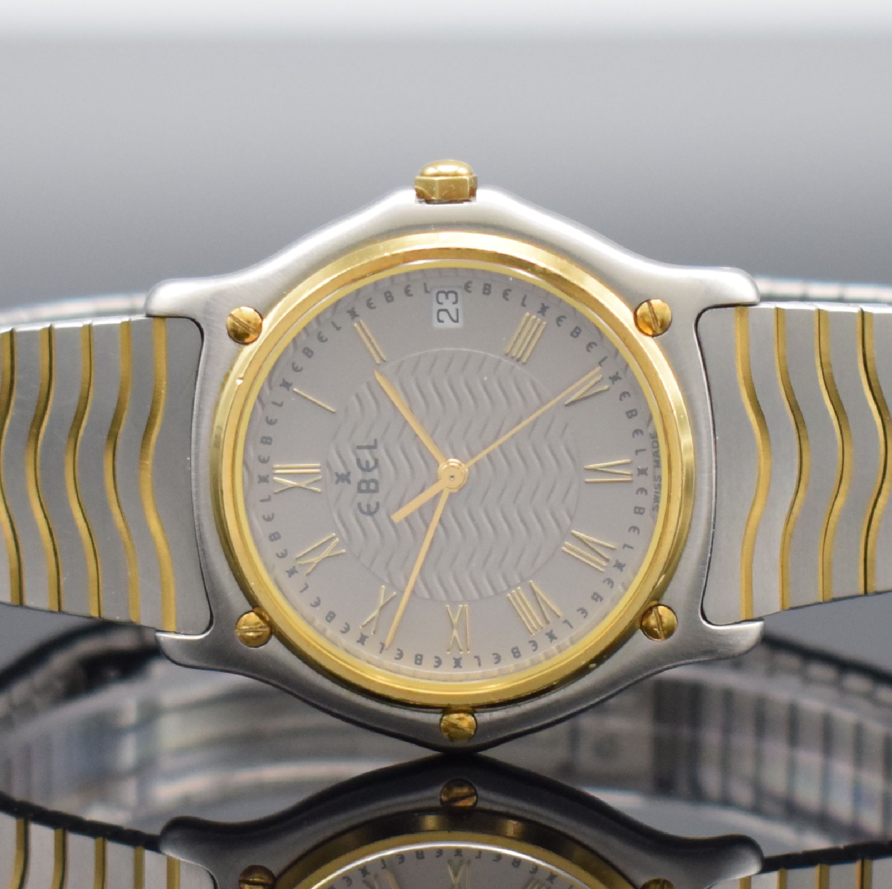 Detail a: EBEL Sport Classique Armbanduhr, Schweiz um 1995, quarz, Ref. E1187141, Stülpgeh. in Edelstahl, GG-Lünette 5-fach verschr., Gliederband in ...
