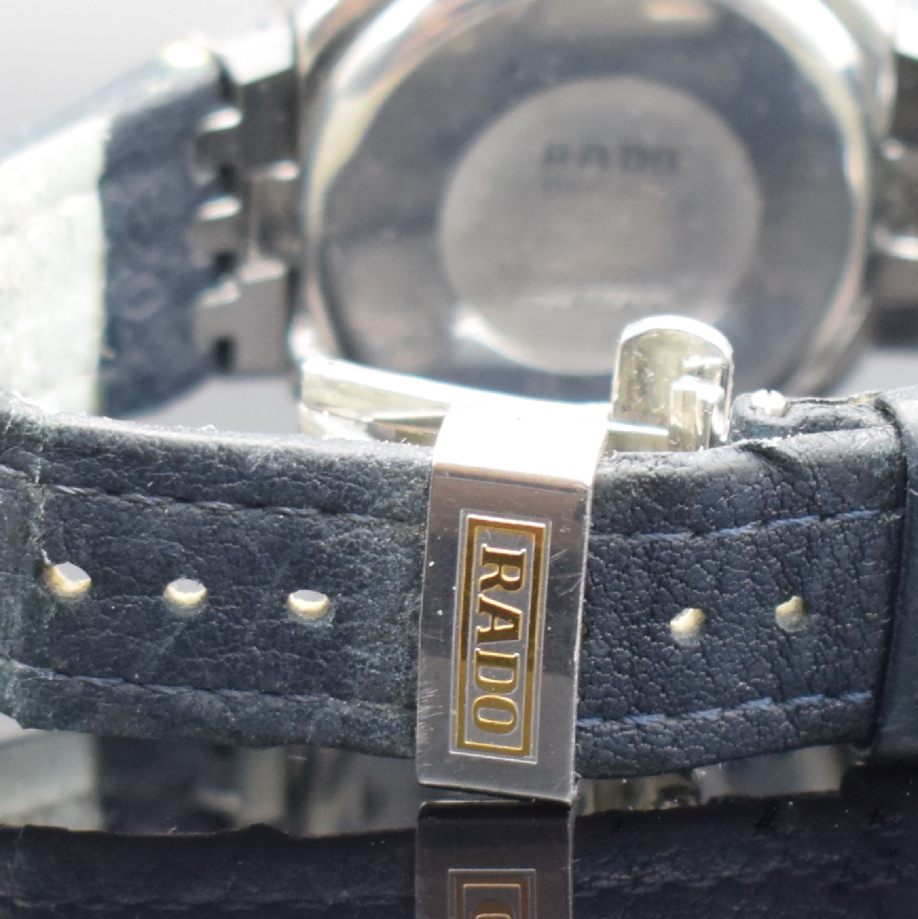 Detail d: RADO Herrenarmbanduhr mit Chronograph Serie Diastar, Schweiz um 1995, quarz, Ref. 539.0377.3, kratzfestes Stahlgeh., Boden aufgedr., orig. Lederband ...