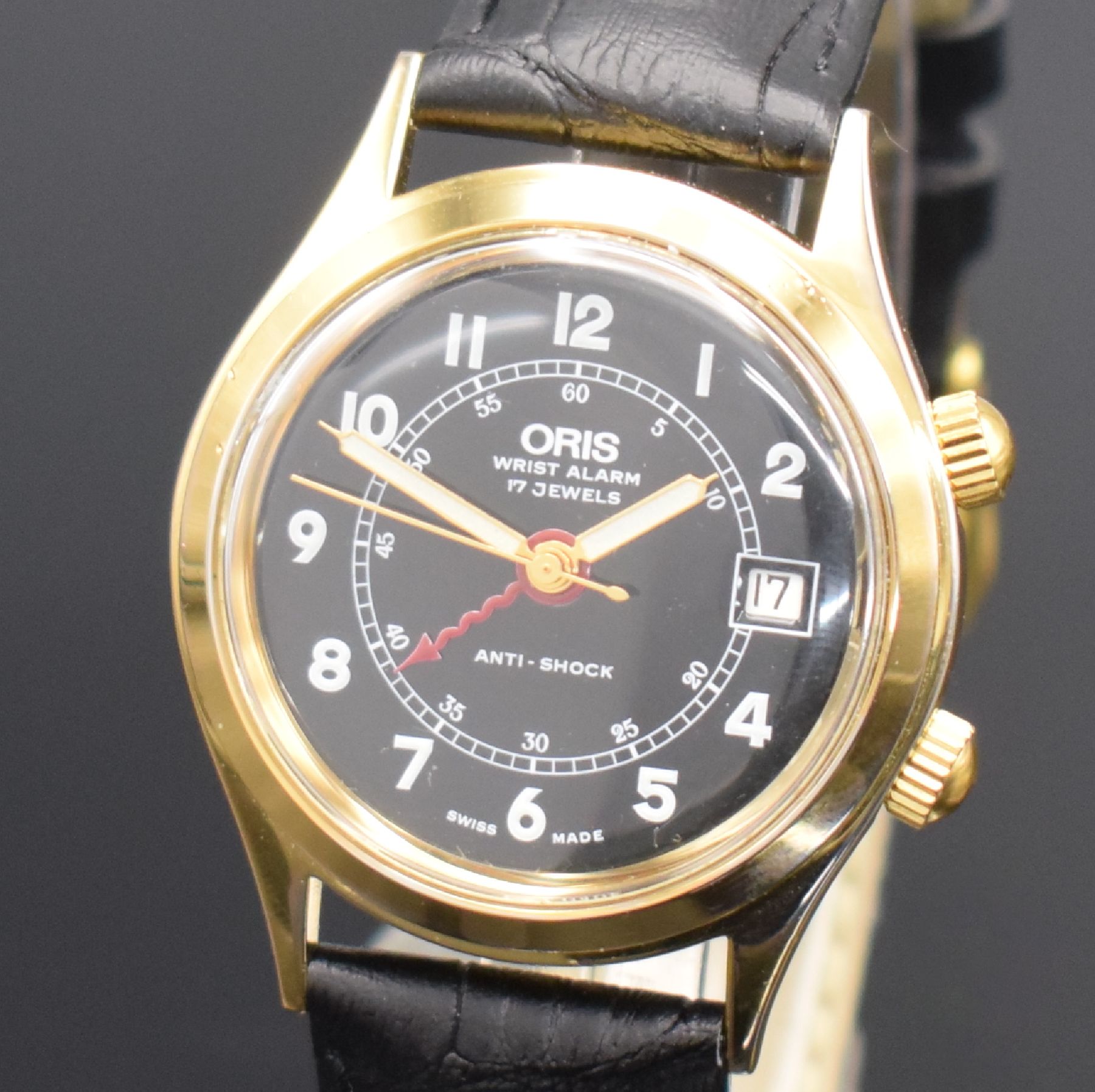 Detail a: ORIS vergoldete Armbanduhr Modell Wrist Alarm, Schweiz um 1990, Ref. 420-7387, Handaufzug, Stahlboden verschr., neutr. Lederband m. orig. Dornschl., ...