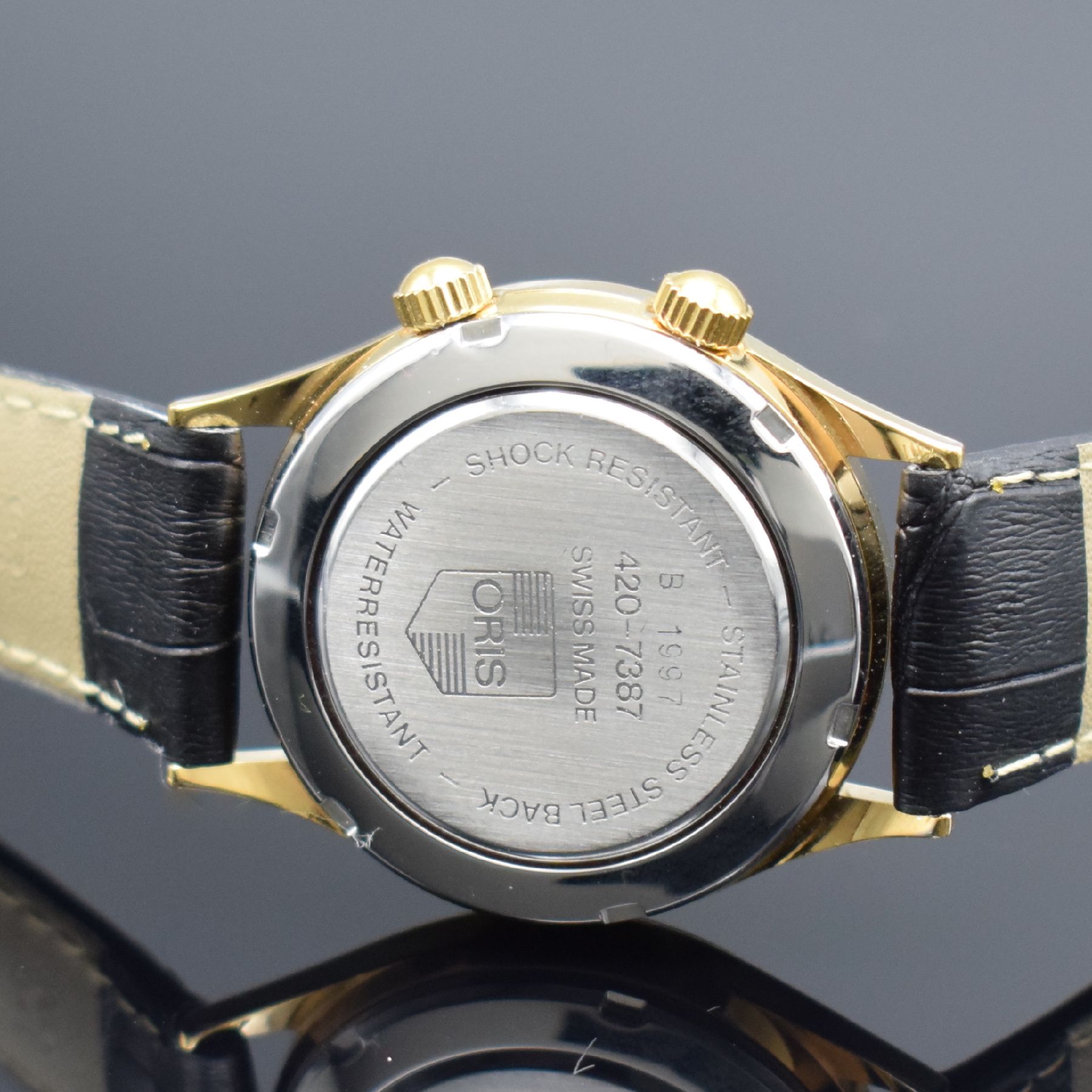Detail c: ORIS vergoldete Armbanduhr Modell Wrist Alarm, Schweiz um 1990, Ref. 420-7387, Handaufzug, Stahlboden verschr., neutr. Lederband m. orig. Dornschl., ...