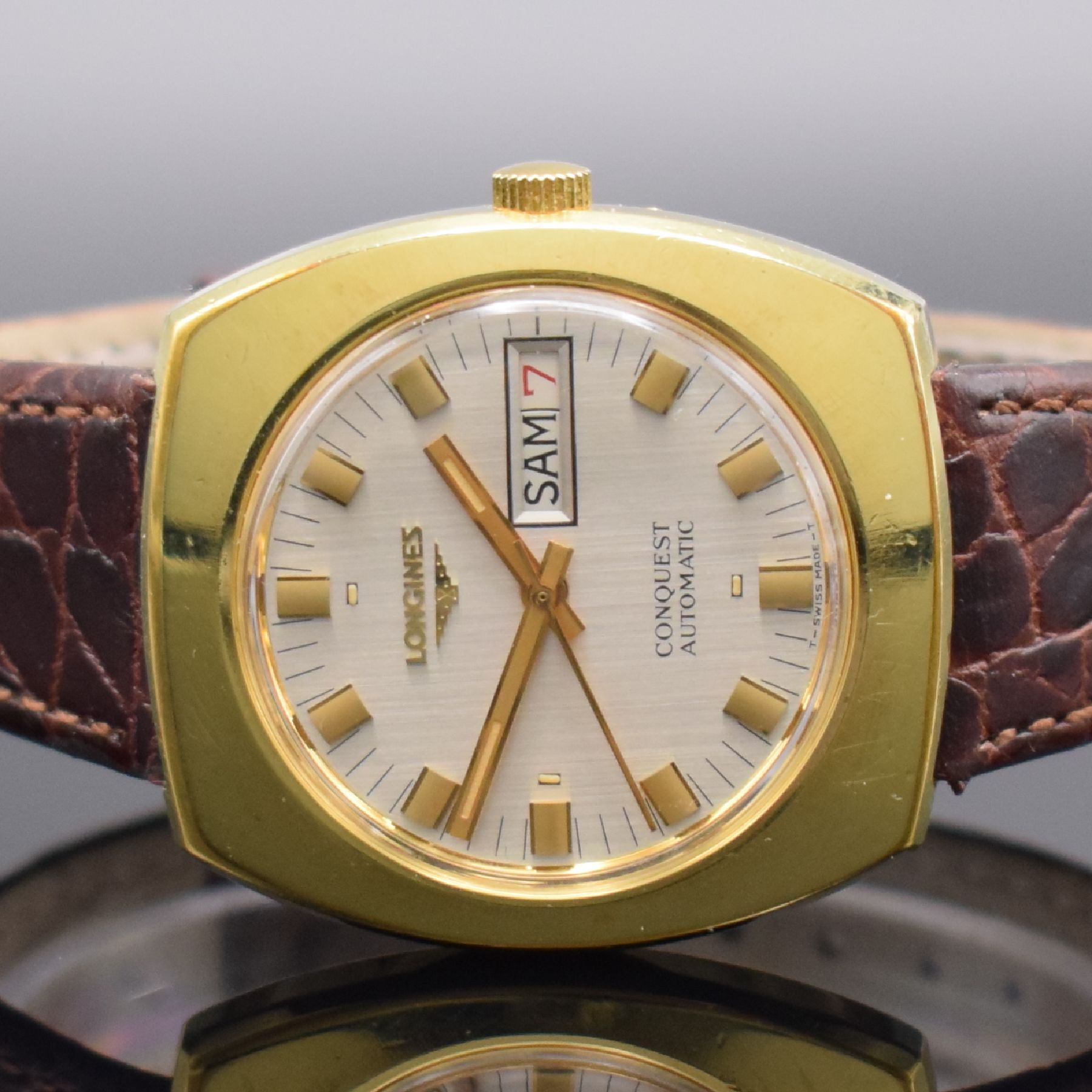 Detail a: LONGINES Conquest vergoldete Herrenarmbanduhr, Schweiz um 1970, Automatik, Edelstahl/Gold komb., Boden verschr., silb. Zifferbl. m. Tritium ...