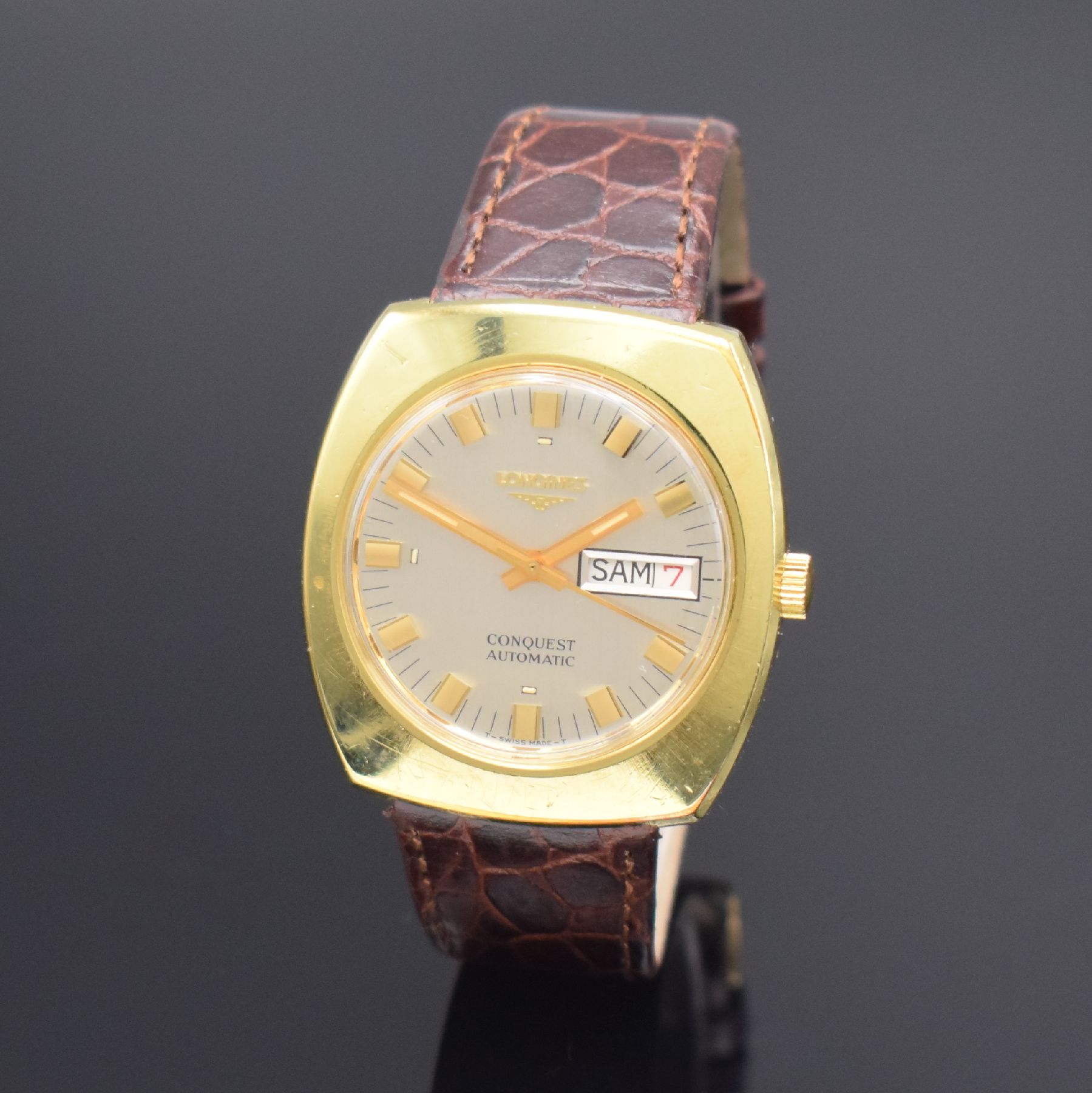 Detail b: LONGINES Conquest vergoldete Herrenarmbanduhr, Schweiz um 1970, Automatik, Edelstahl/Gold komb., Boden verschr., silb. Zifferbl. m. Tritium ...