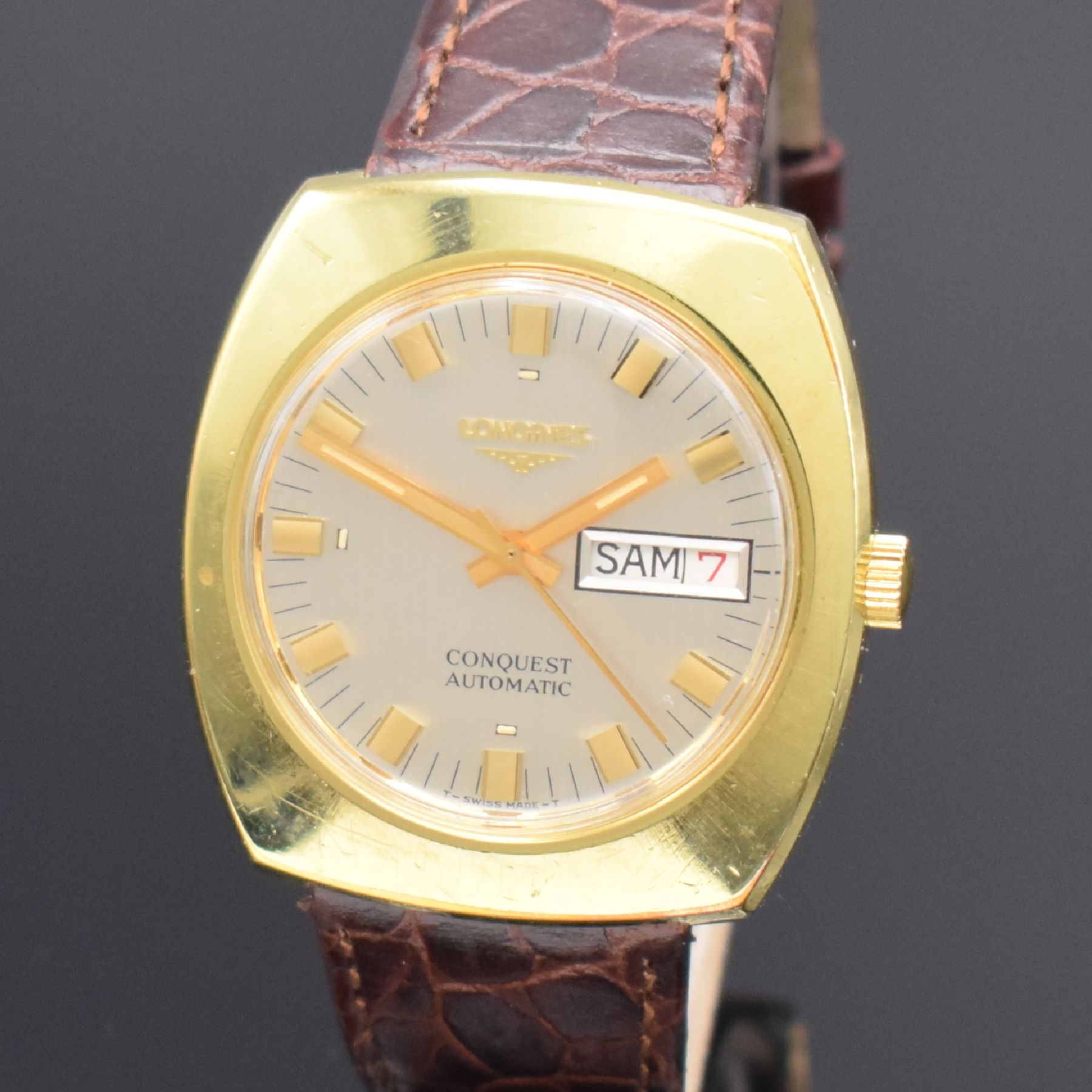 Detail c: LONGINES Conquest vergoldete Herrenarmbanduhr, Schweiz um 1970, Automatik, Edelstahl/Gold komb., Boden verschr., silb. Zifferbl. m. Tritium ...