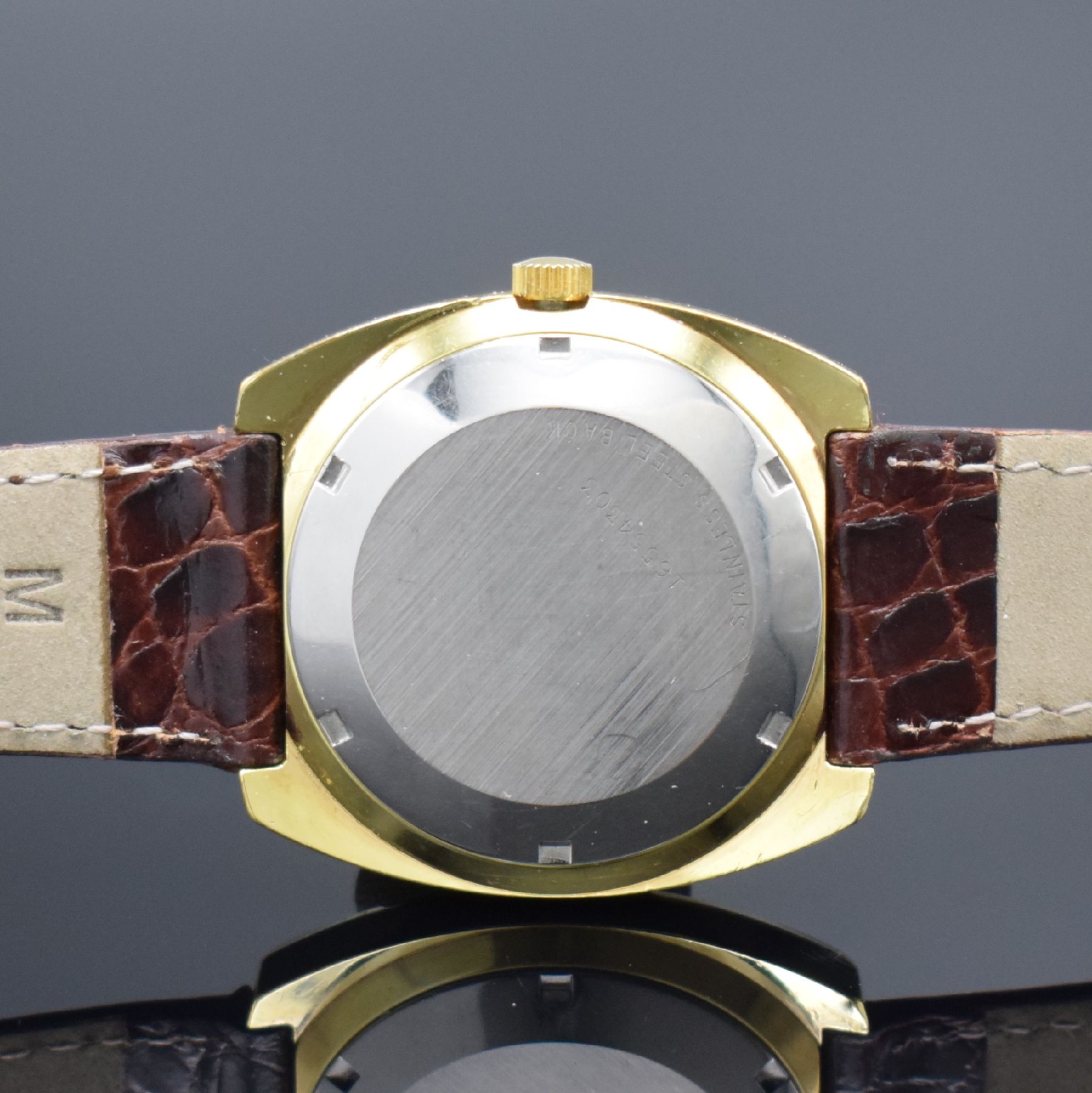 Detail d: LONGINES Conquest vergoldete Herrenarmbanduhr, Schweiz um 1970, Automatik, Edelstahl/Gold komb., Boden verschr., silb. Zifferbl. m. Tritium ...