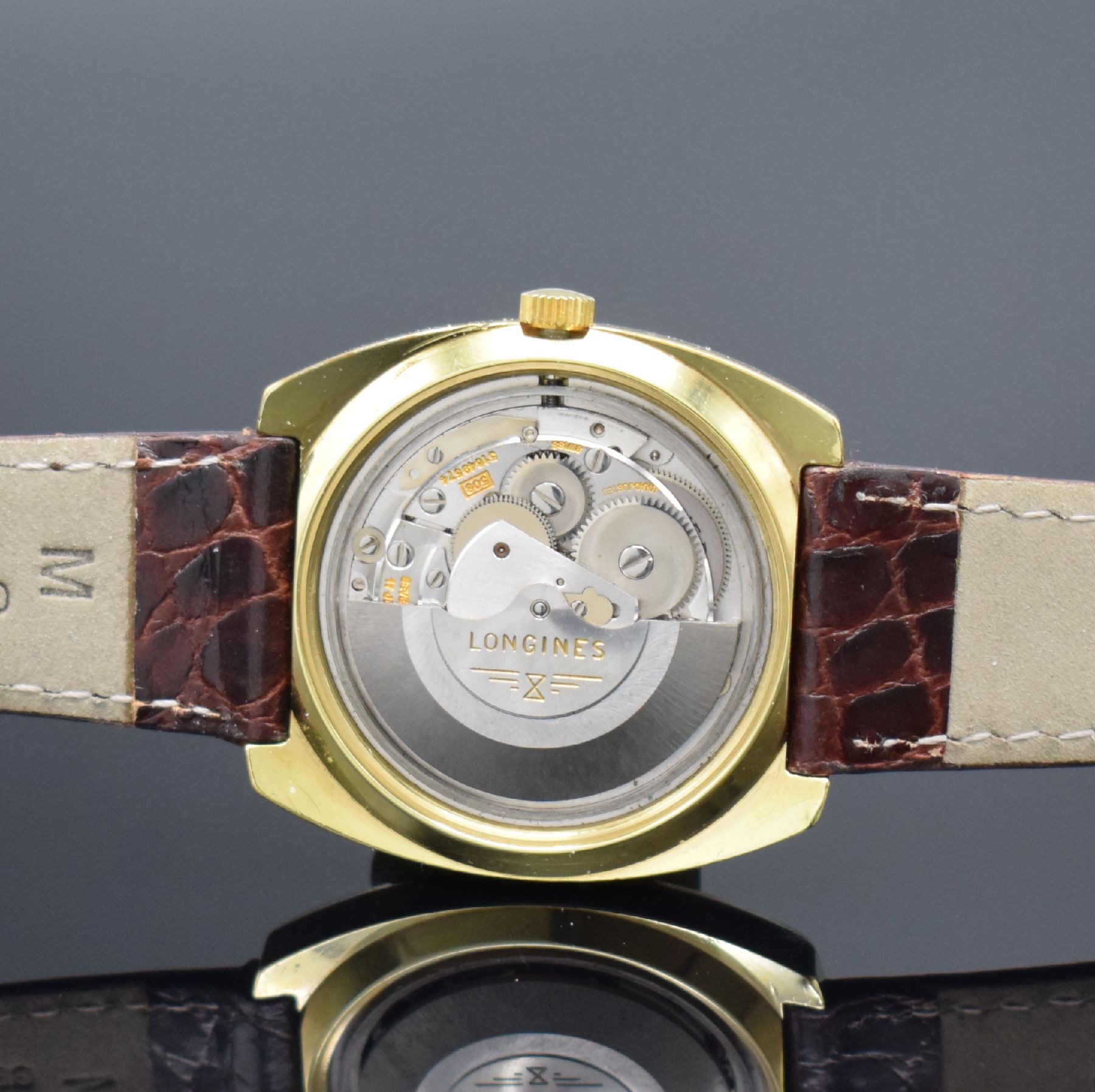 Detail e: LONGINES Conquest vergoldete Herrenarmbanduhr, Schweiz um 1970, Automatik, Edelstahl/Gold komb., Boden verschr., silb. Zifferbl. m. Tritium ...