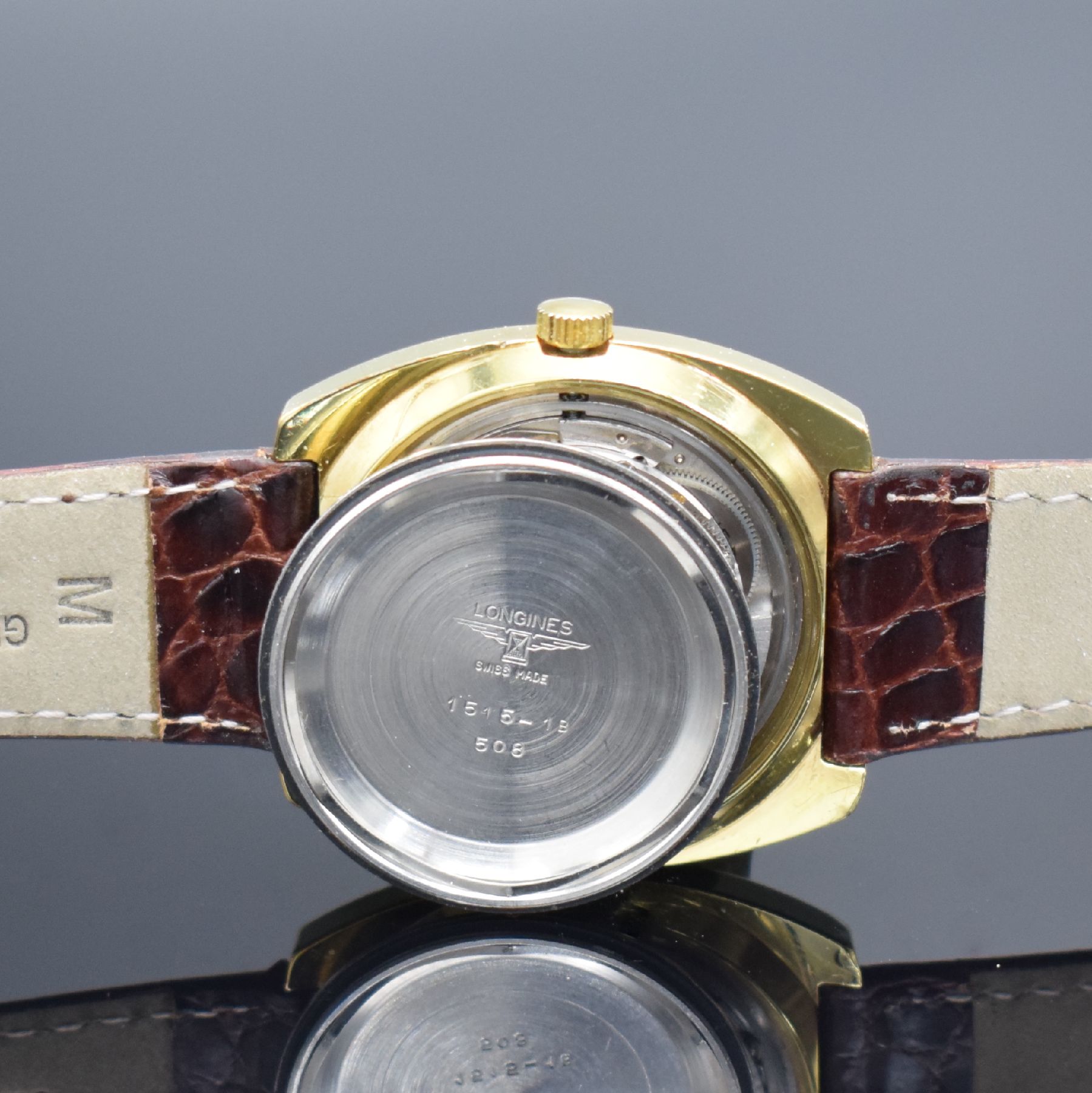 Detail g: LONGINES Conquest vergoldete Herrenarmbanduhr, Schweiz um 1970, Automatik, Edelstahl/Gold komb., Boden verschr., silb. Zifferbl. m. Tritium ...