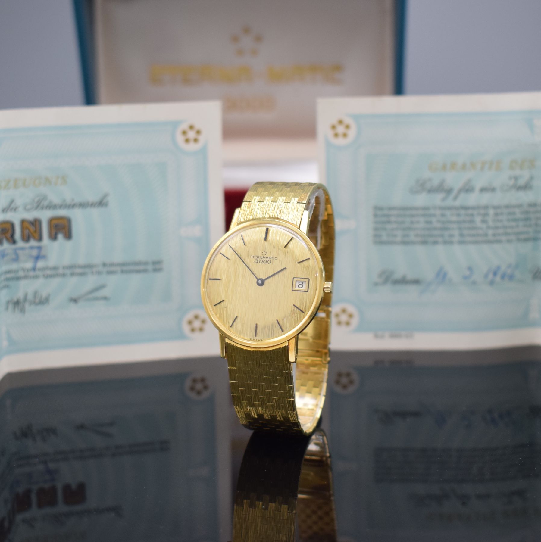 Detail b: ETERNA-MATIC 3000 nahezu neuwertige Herrenarmbanduhr in GG 750/000 mit Box & Papier Referenz 744, Schweiz um 1965, Automatik, flaches Geh., Boden & ...