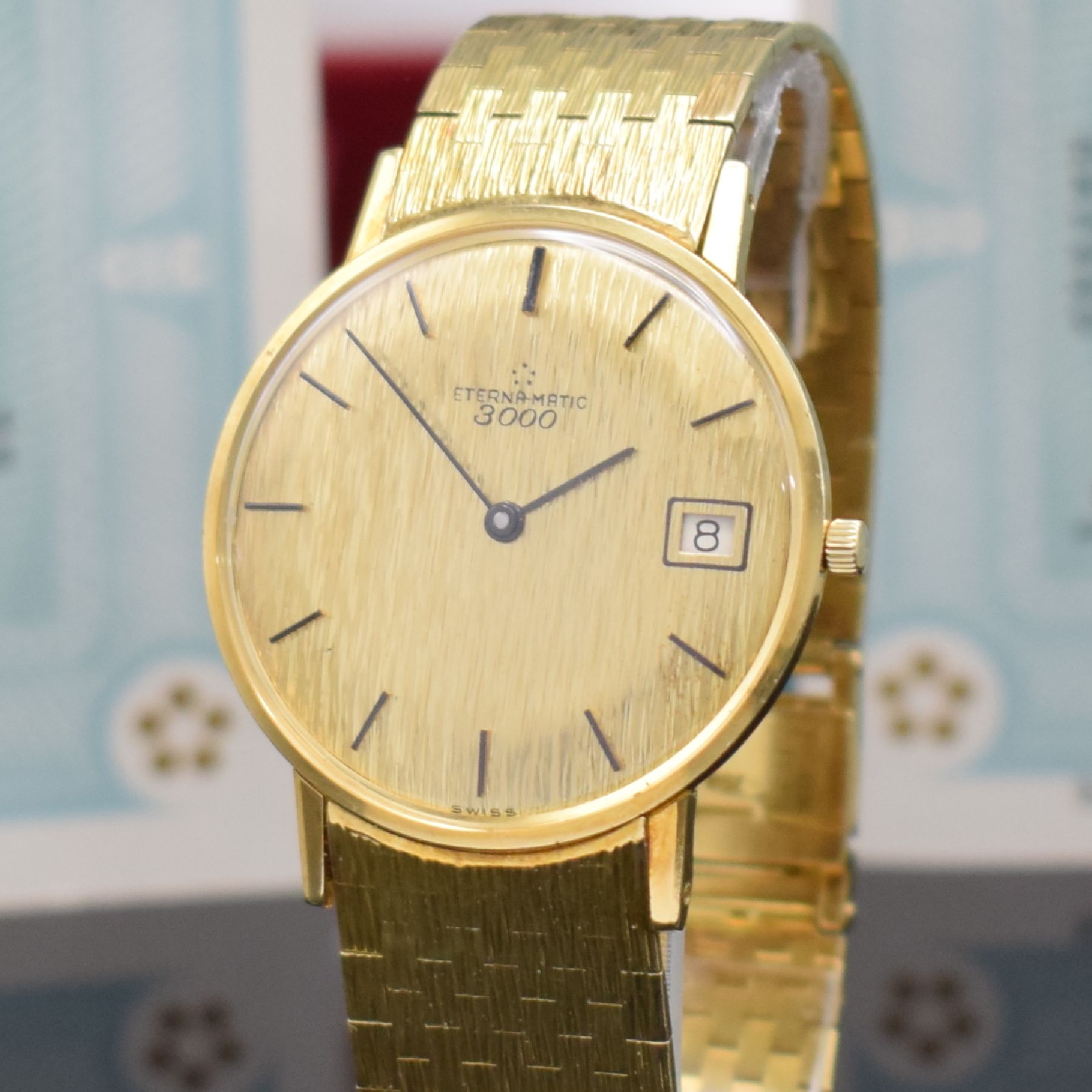Detail d: ETERNA-MATIC 3000 nahezu neuwertige Herrenarmbanduhr in GG 750/000 mit Box & Papier Referenz 744, Schweiz um 1965, Automatik, flaches Geh., Boden & ...