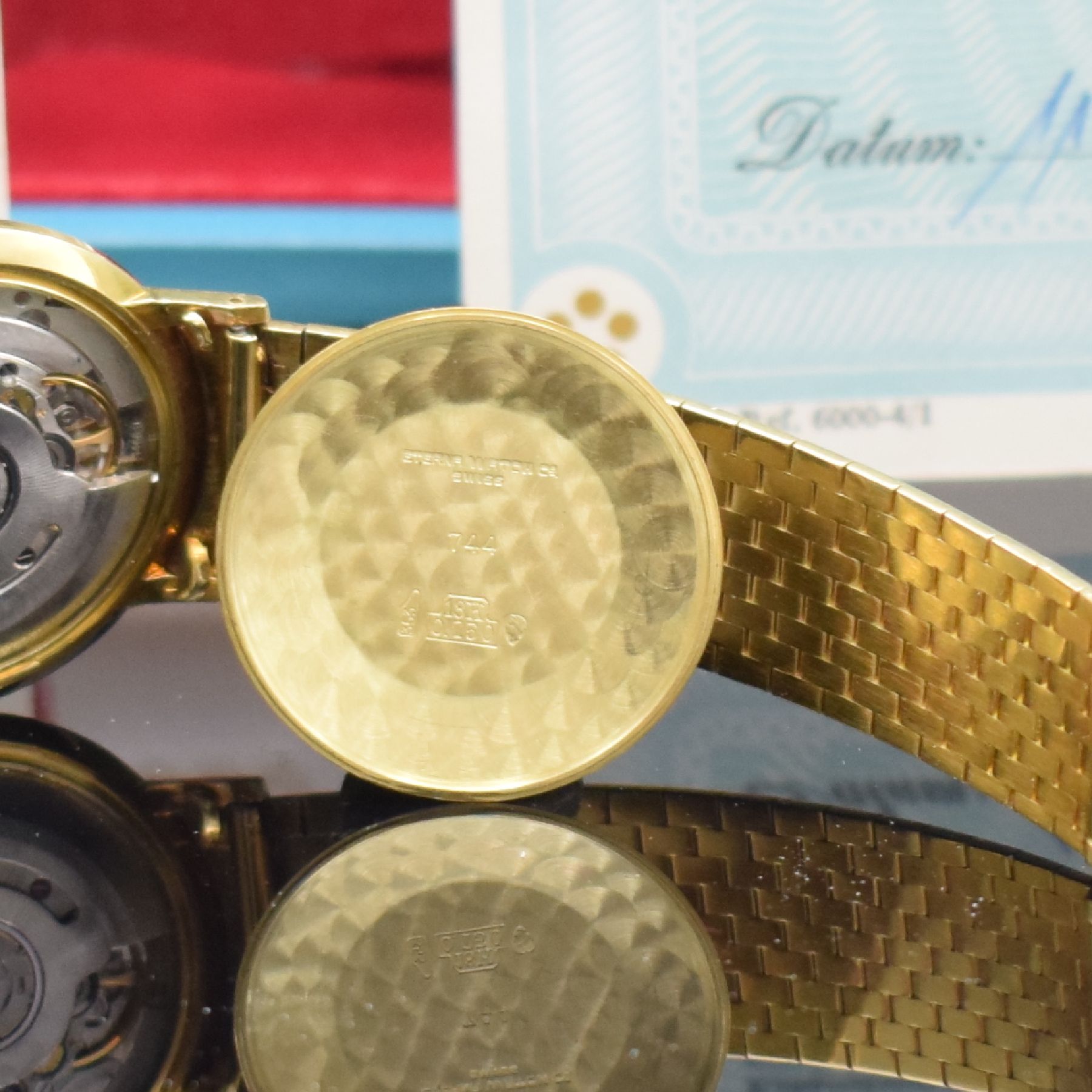 Detail j: ETERNA-MATIC 3000 nahezu neuwertige Herrenarmbanduhr in GG 750/000 mit Box & Papier Referenz 744, Schweiz um 1965, Automatik, flaches Geh., Boden & ...