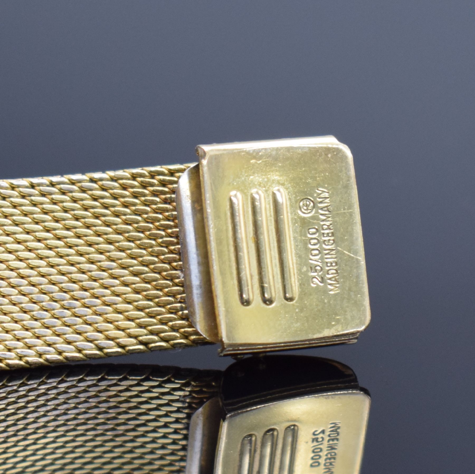 Detail d: STOWA Herrenarmbanduhr in GG 585/000, Deutschland um 1965, Handaufzug, Boden aufgedr., verg. Band, vers. Zifferbl. m. gold. Ind. & Zeigern, Kal. PUW ...