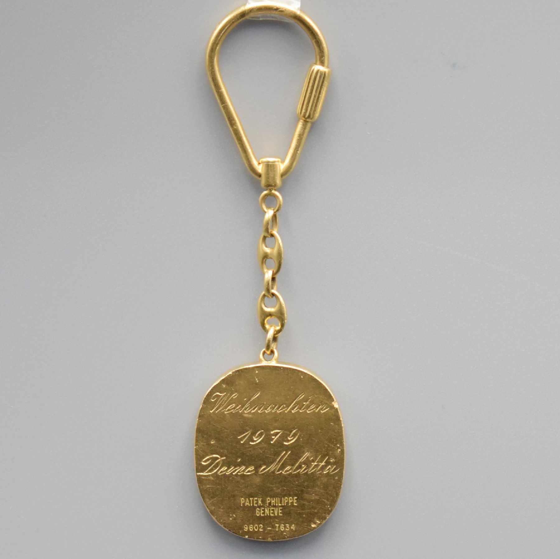 Detail d: PATEK PHILIPPE Ellipse D'or Schlüsselanhänger in GG 750/000 Referenz 9602, Schweiz lt. Widmungsgravur auf Boden um 1979, Geh. dell., ...